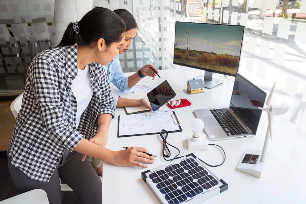 Two woman discussing about solar energy