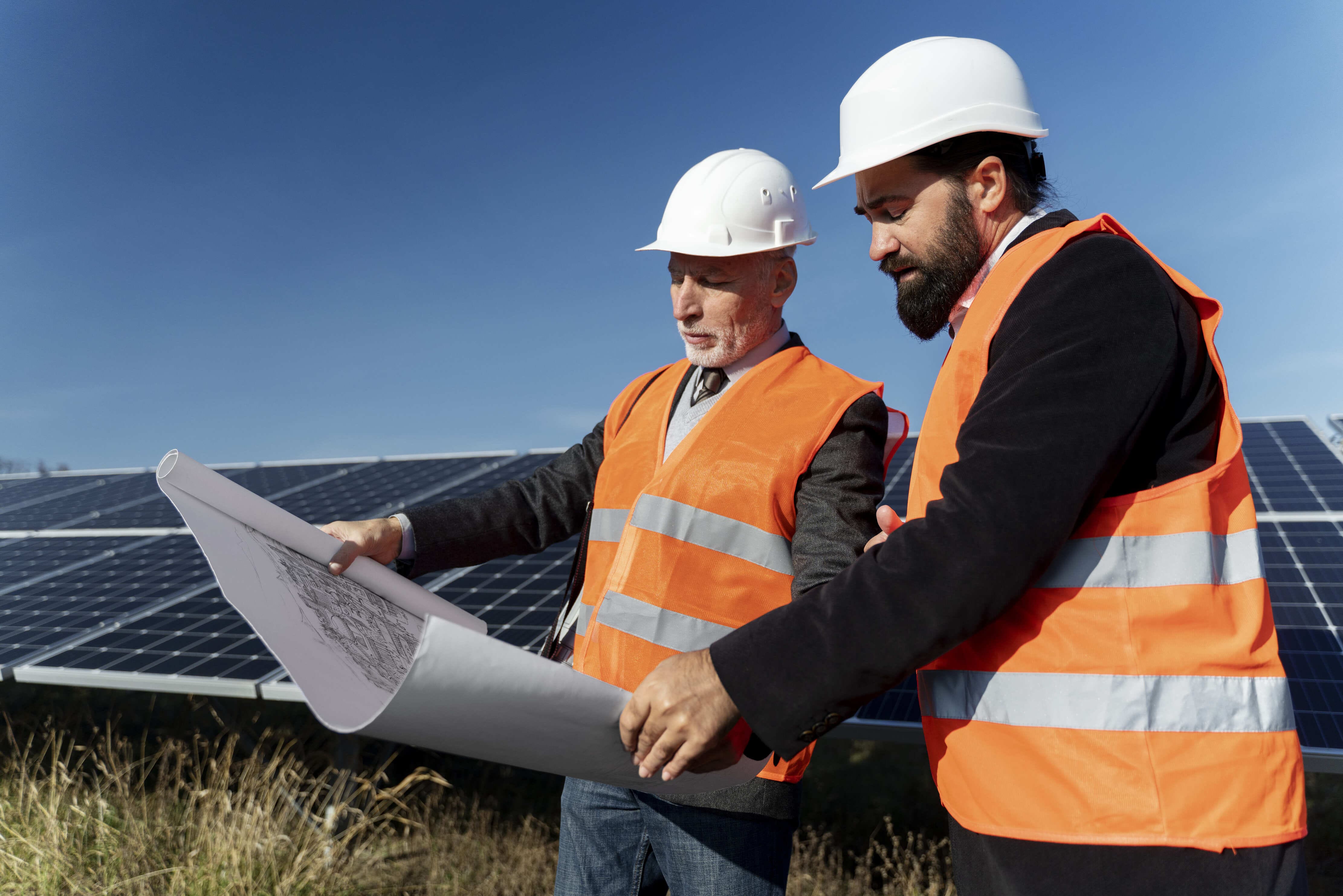 two men near energy plant