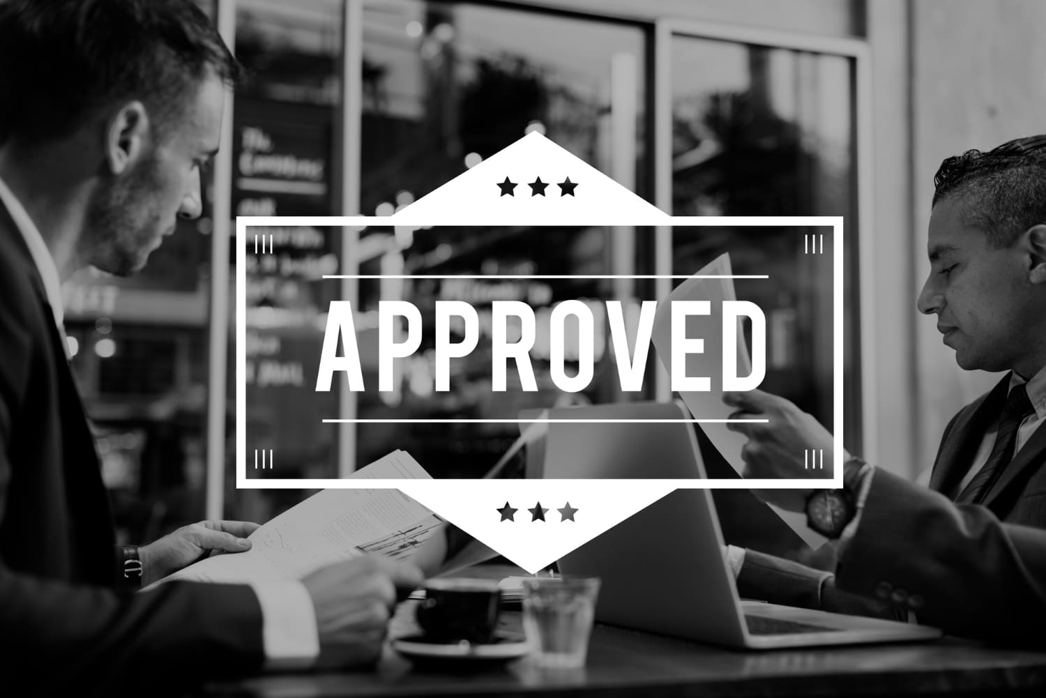 two people discussing approval permit