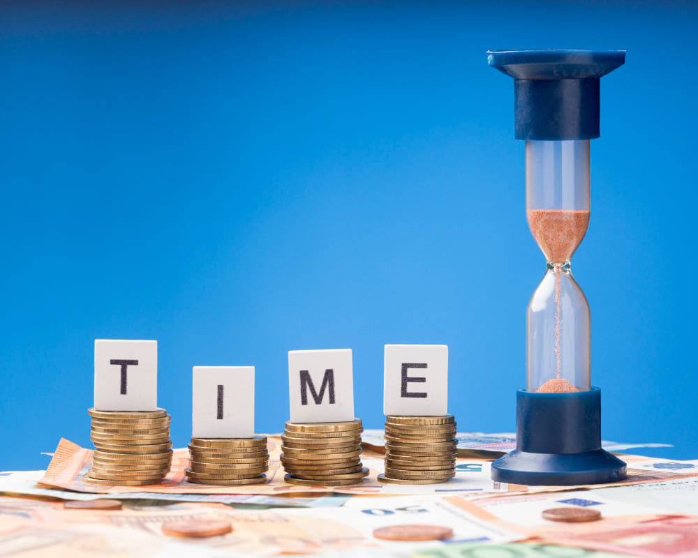 clock and money referring to time and cost