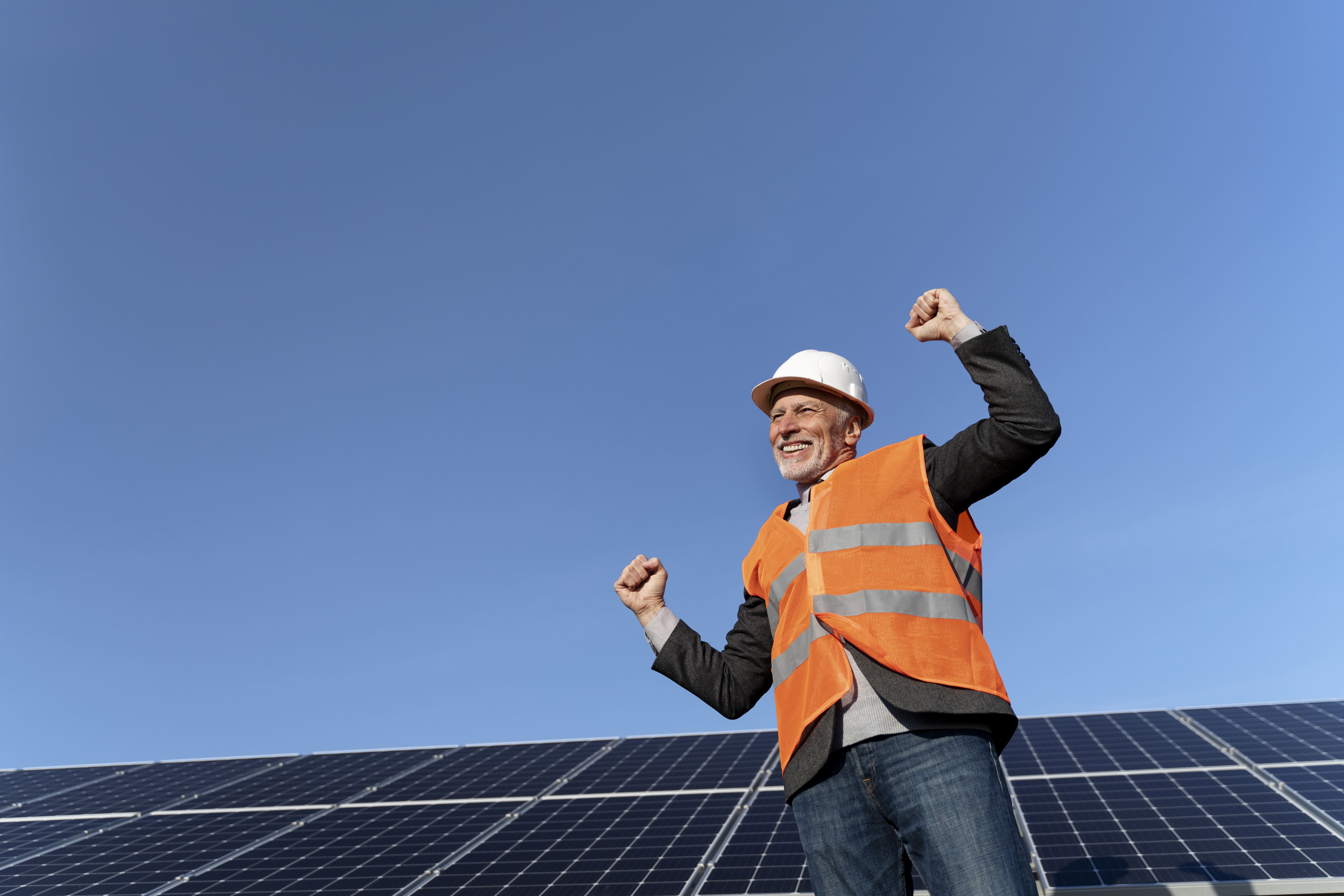 Person near alternative energy plant