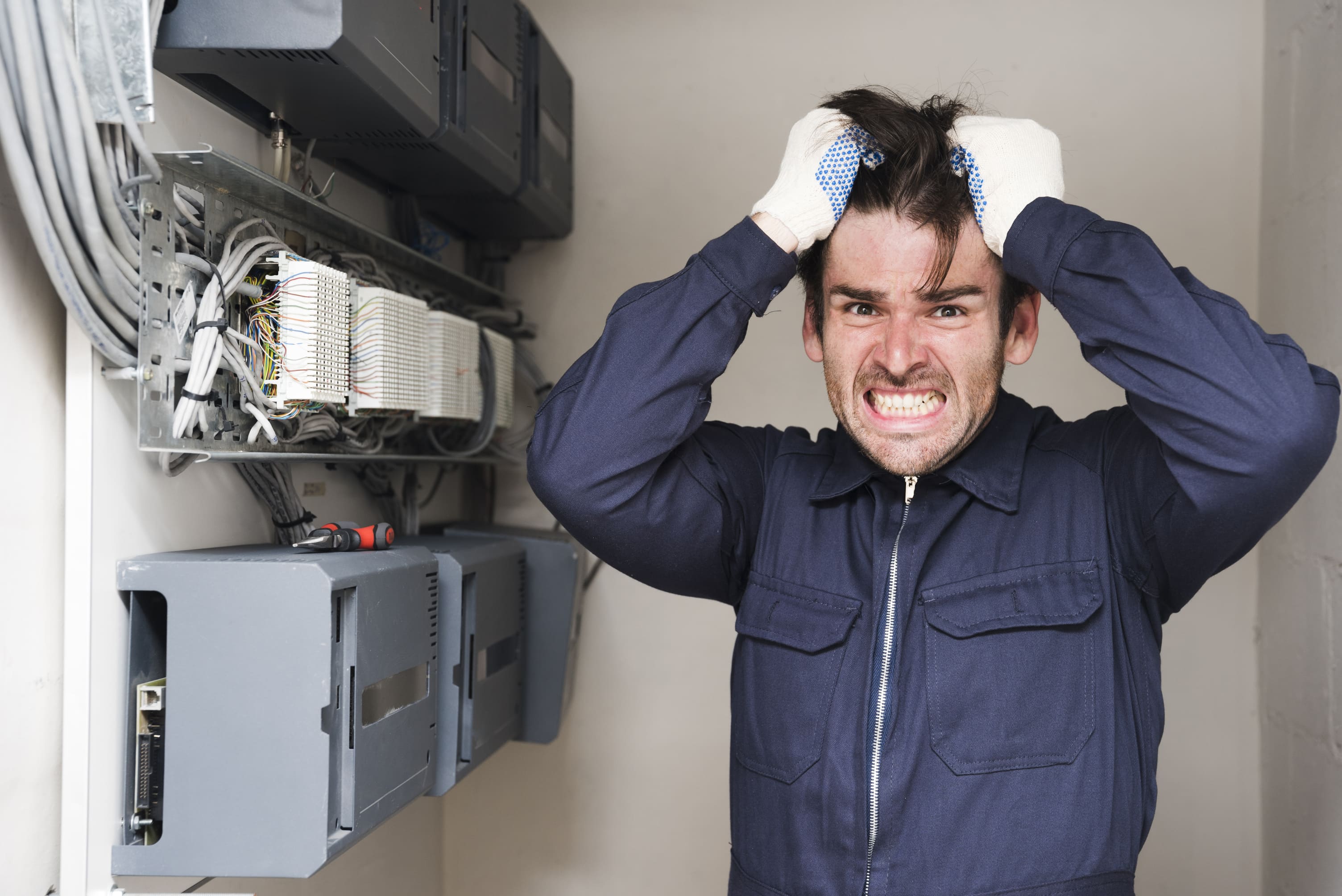 Frustrated electrician struggles with switchboard wiring problem