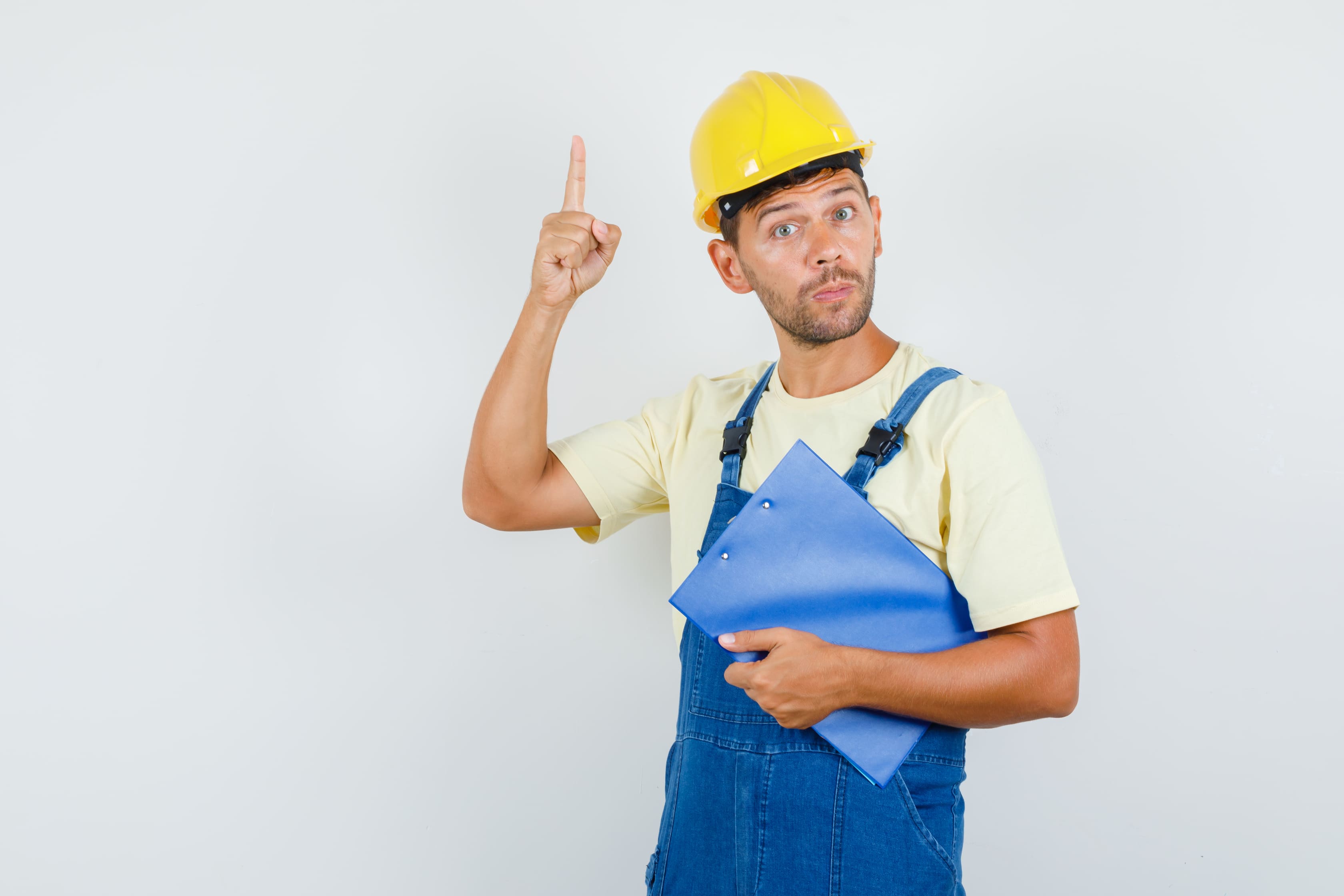 Construction worker points up with great idea
