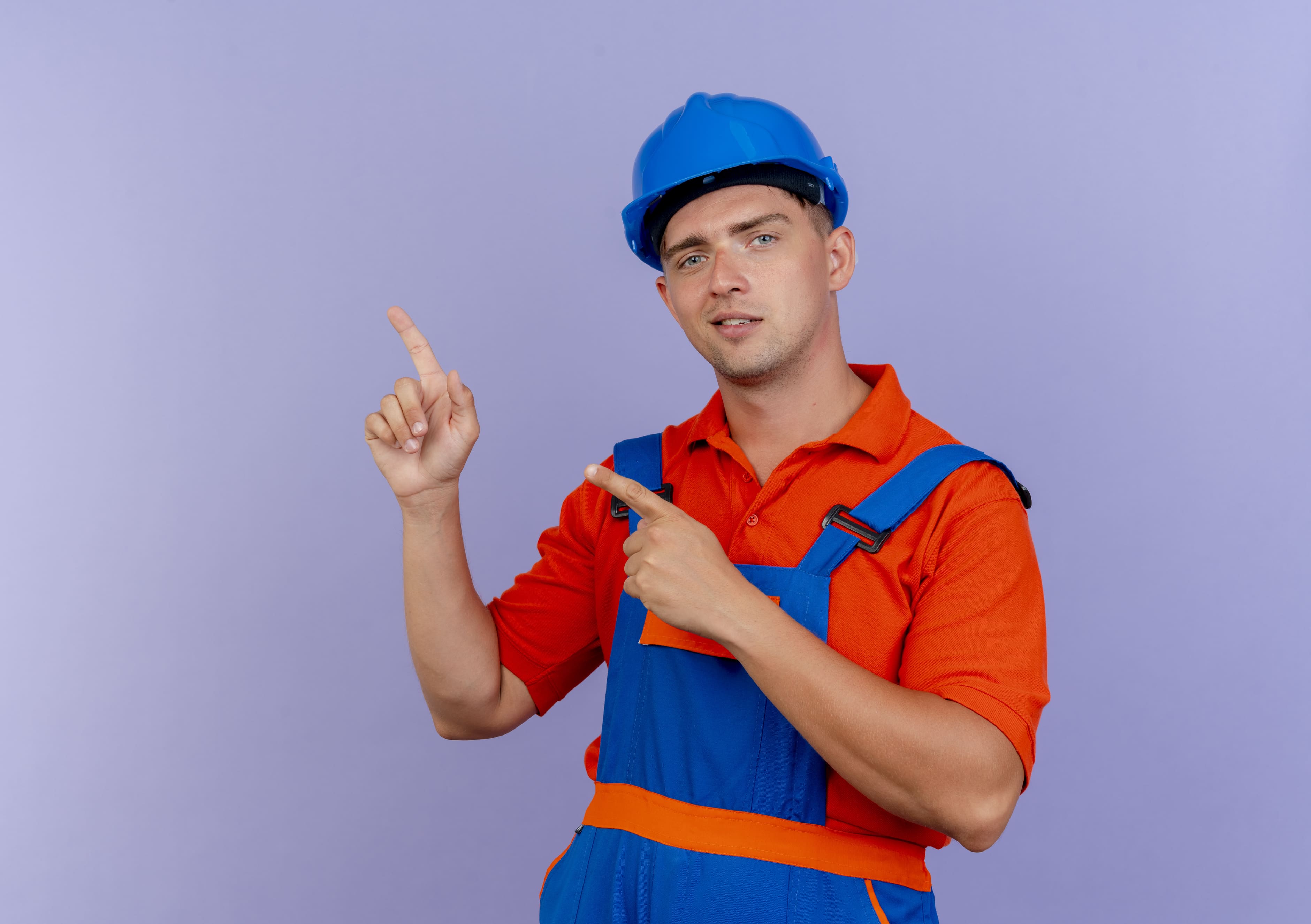 Construction worker points to a new direction or plan