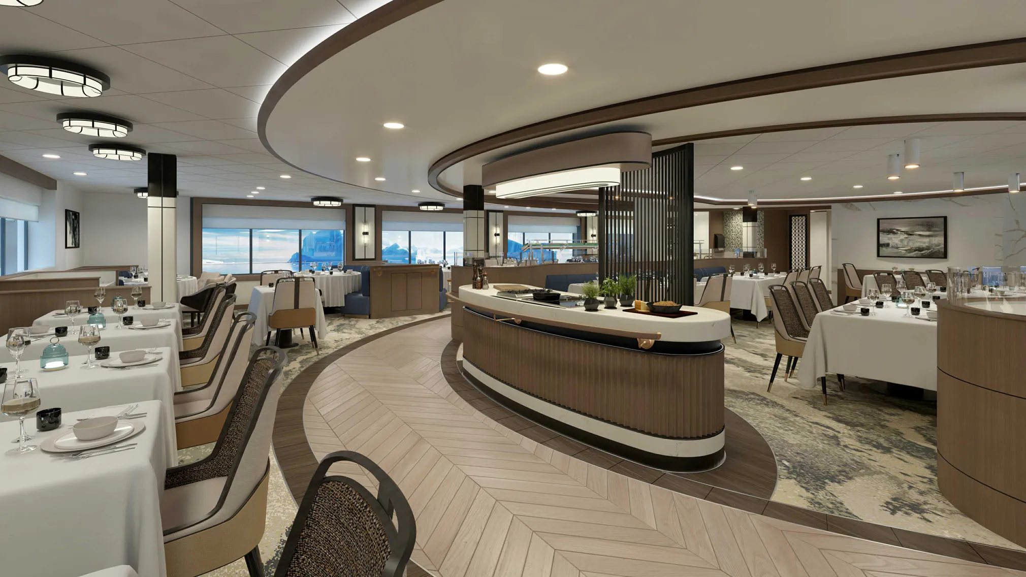 Modern cruise ship dining room with neatly arranged tables, large windows showing an icy landscape outside, and a central oval counter with plants and kitchen equipment.