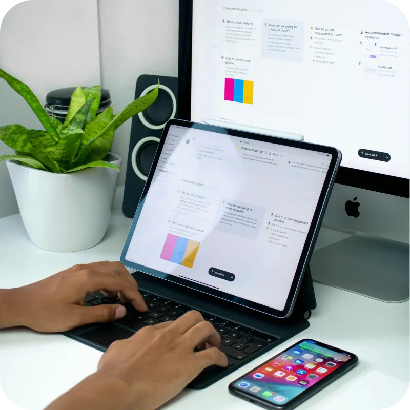 A user checking a site on three different devices
