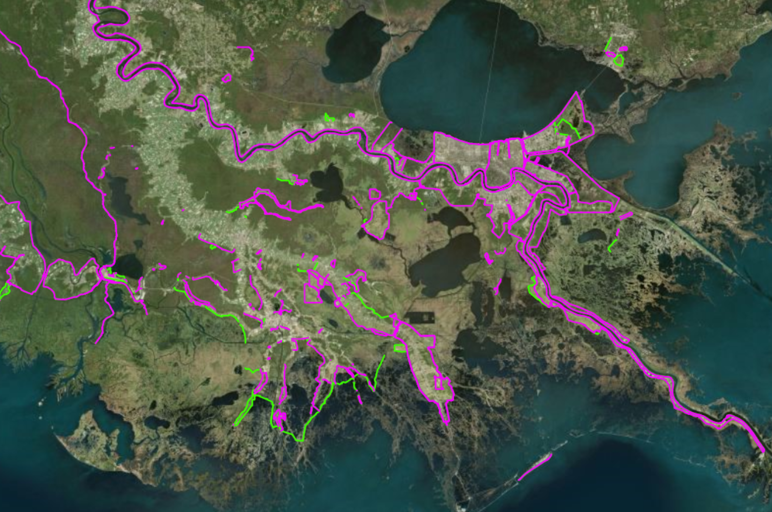 Satellite image with green and magenta lines tracing detected coastal defenses and waterways