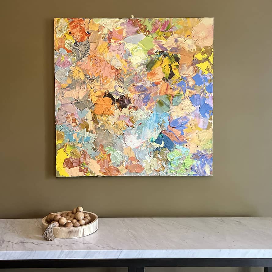 Claudie B painting Ciel du Soir hanging on the wall