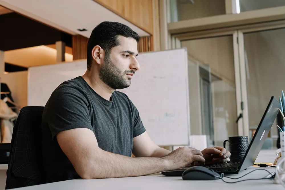 IT help desk technician taking a support call for a small business