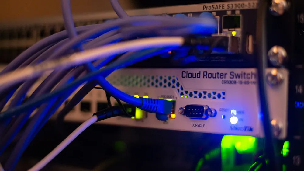 Network switch and cabling representing external, internal, web, mobile and cloud penetration test types