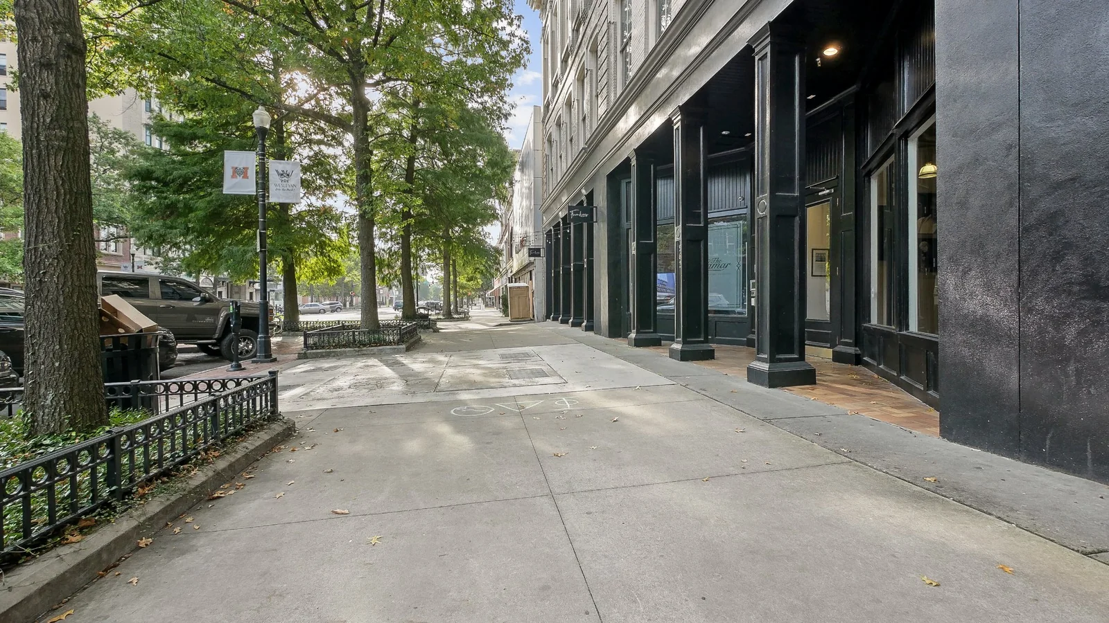Cherry Street sidewalk with tree-lined streets in downtown Macon, Georgia