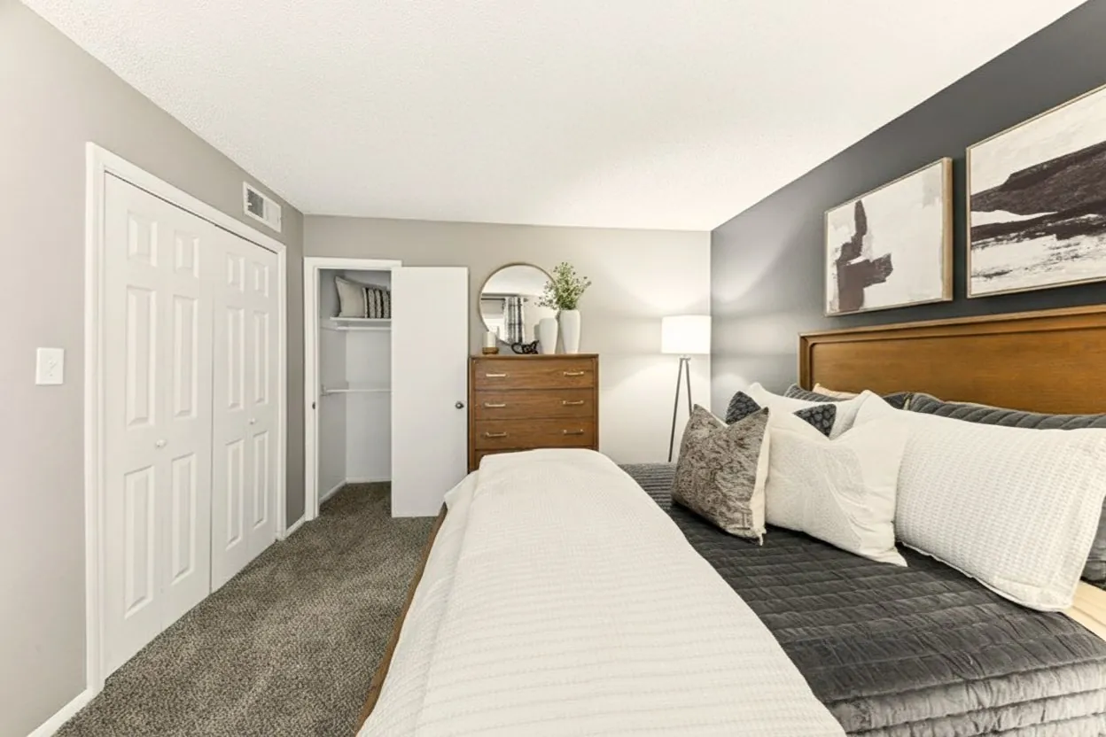 Staged bedroom with accent wall at The Kenzie