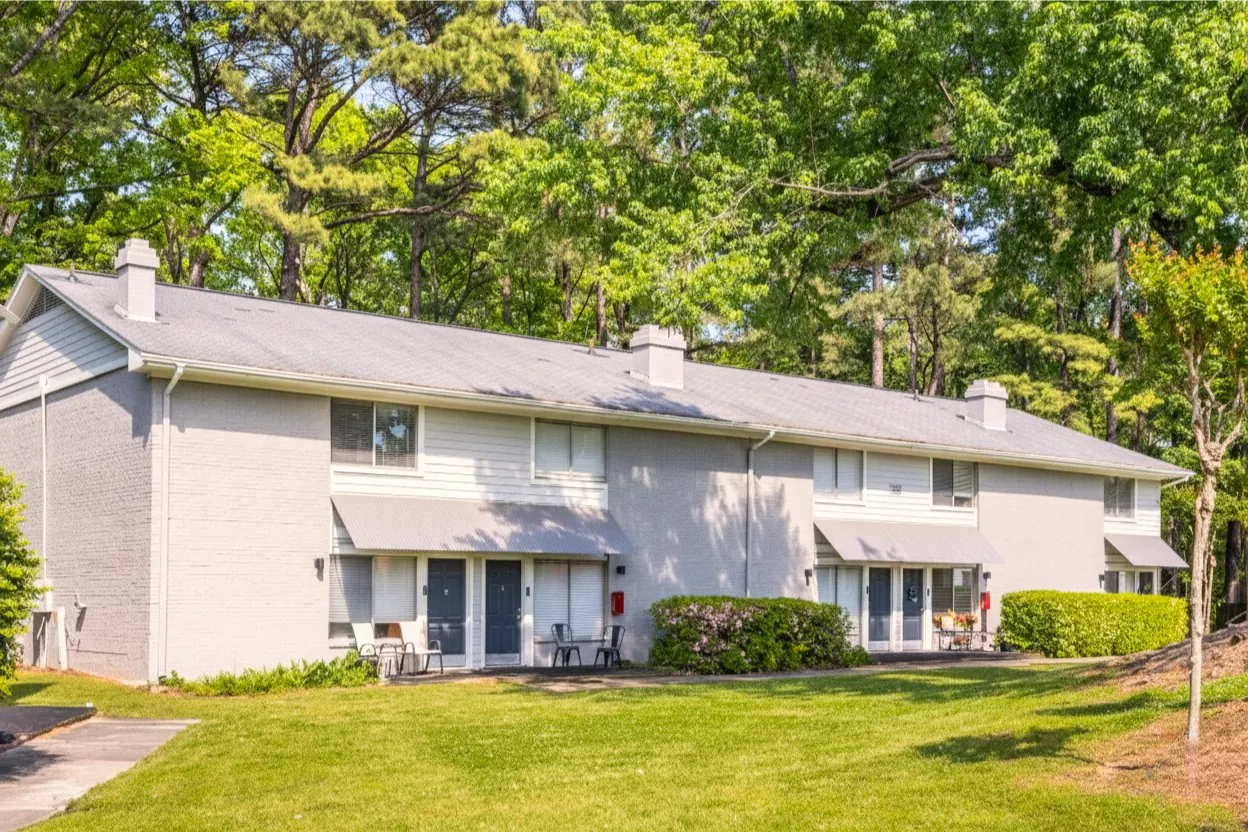 Exterior building surrounded by trees at The Kenzie