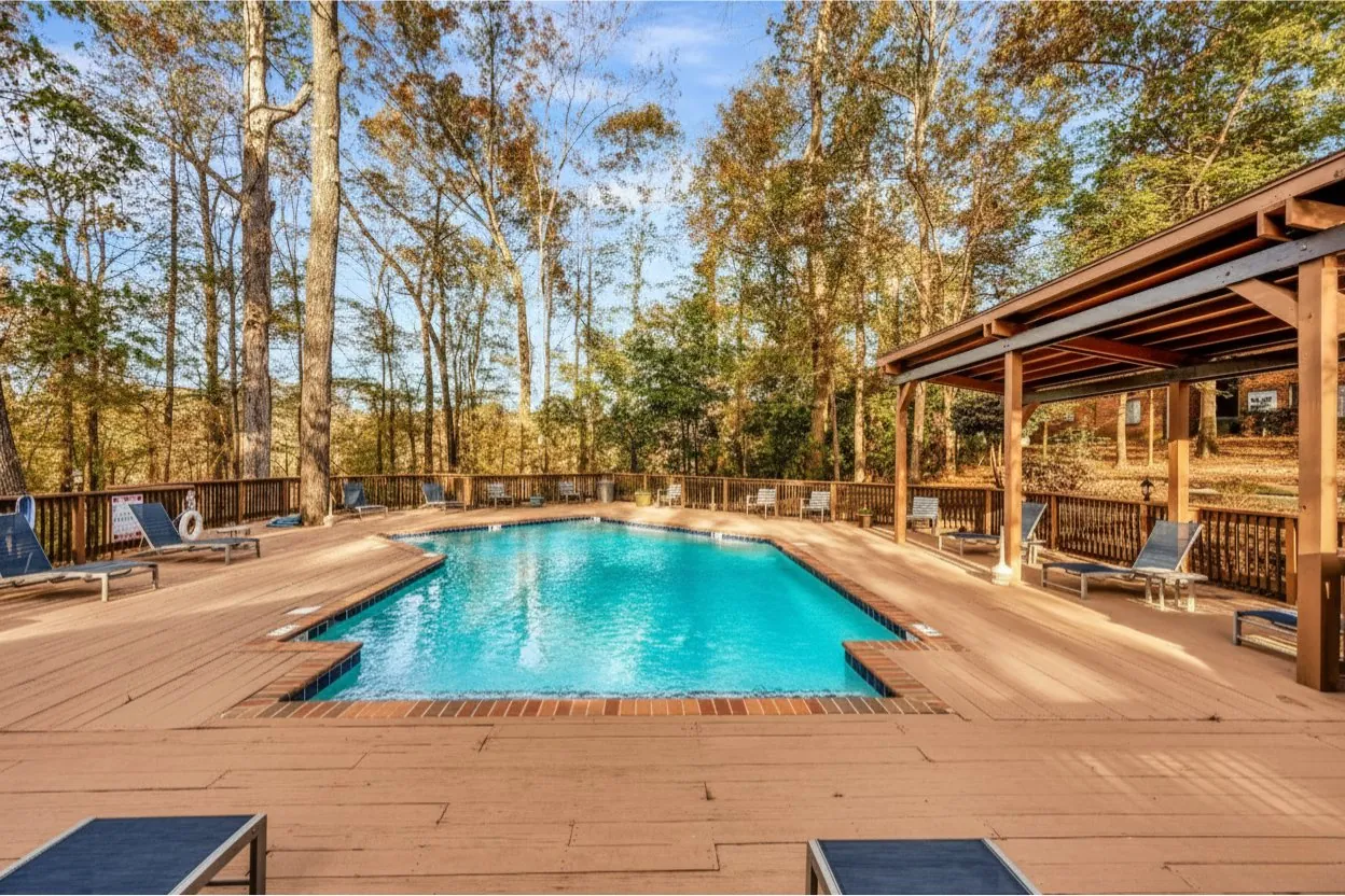 Pool with fall foliage at The Kenzie