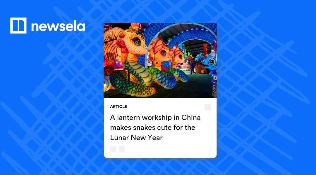 A Newsela article featuring a colorful photo of glowing snake-shaped lanterns at a workshop in China, with the title "A lantern workshop in China makes snakes cute for the Lunar New Year."