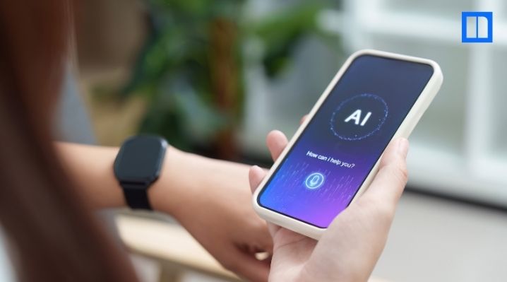 Person holding a smartphone with an AI assistant screen.
