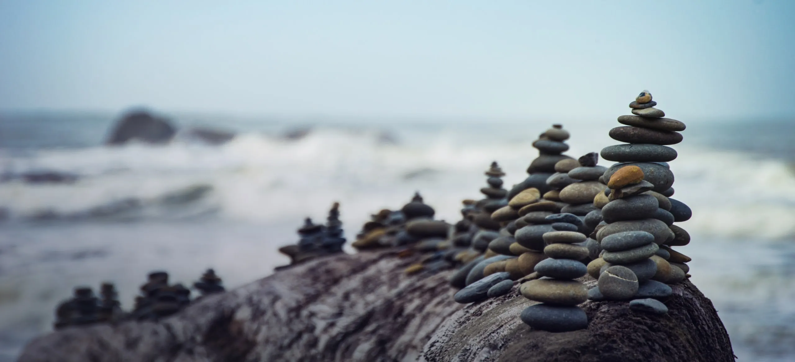 Stones balanced by the sea
