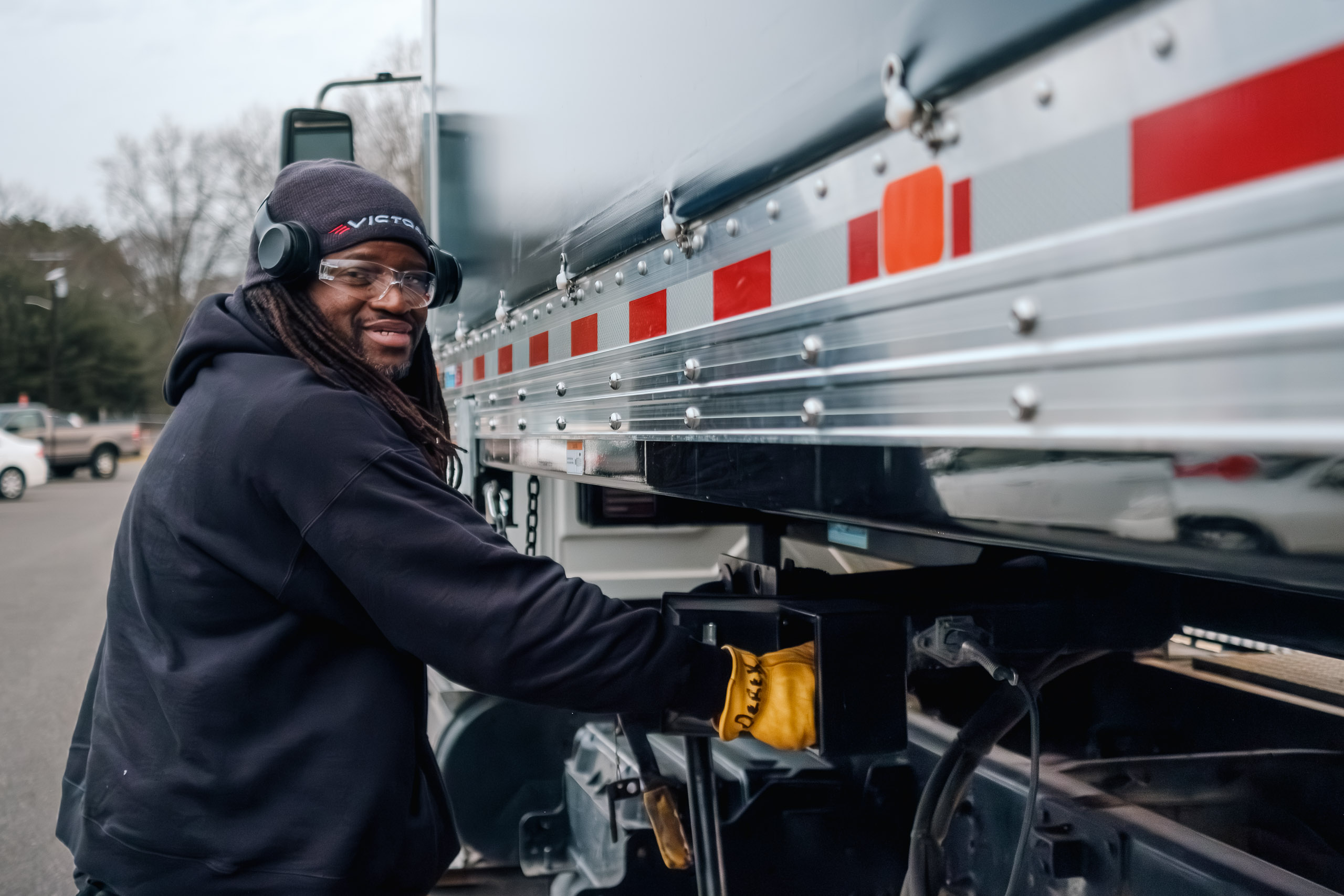 Truck driver operating Swap Body equipment.