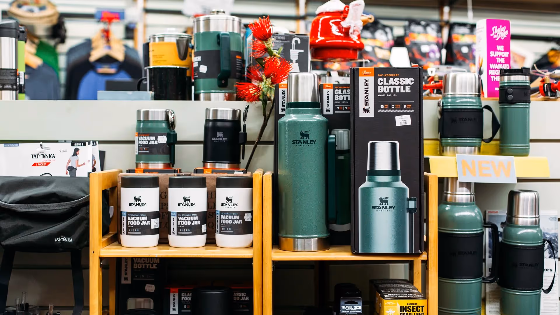 Alt text: Display of Stanley vacuum bottles and food jars in a local Hamilton shop, showcasing quality products for outdoor enthusiasts. Love the Centre promotes local businesses and community experiences in Hamilton.