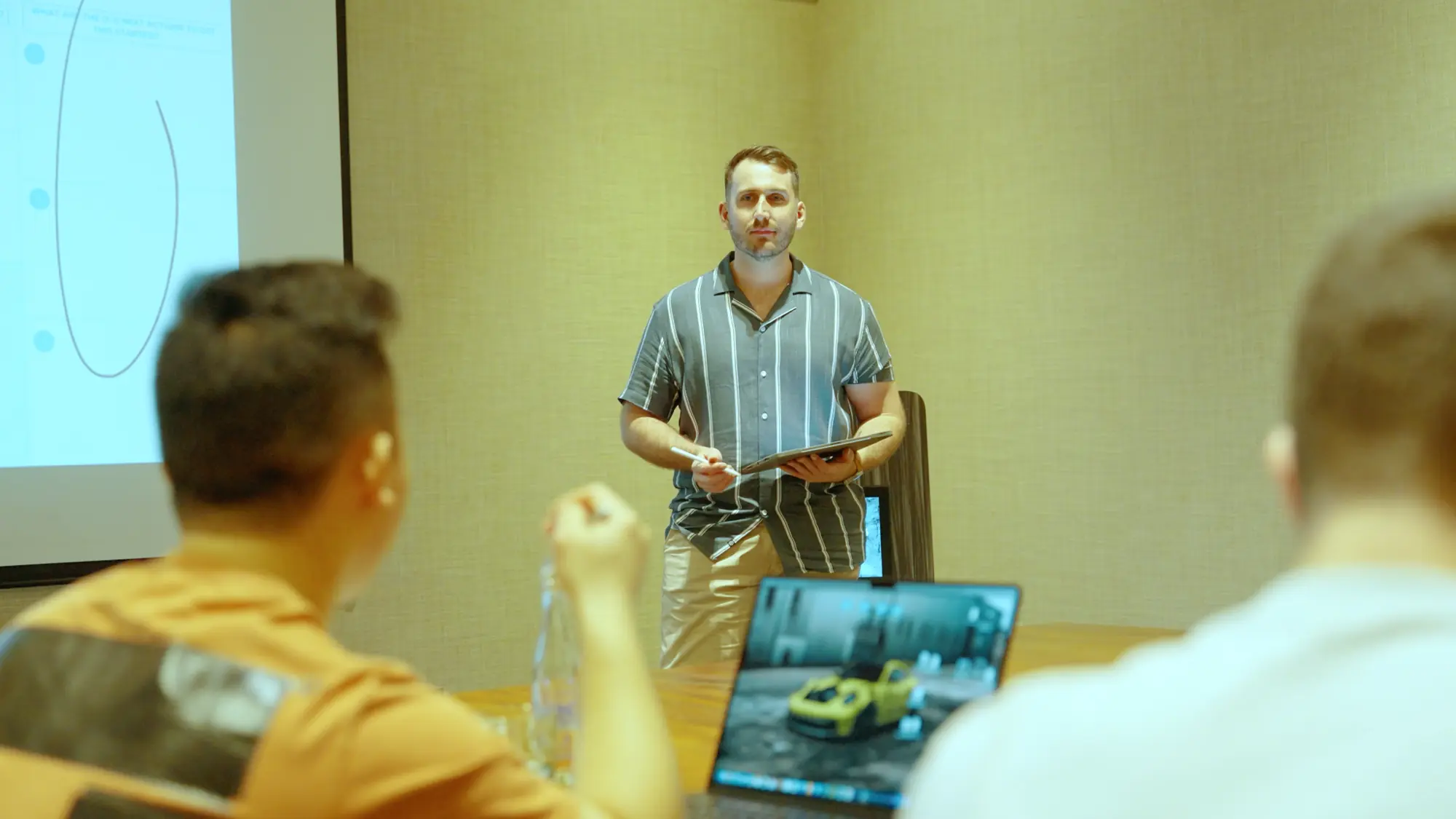 Ayrton working through a problem with Mastermind members