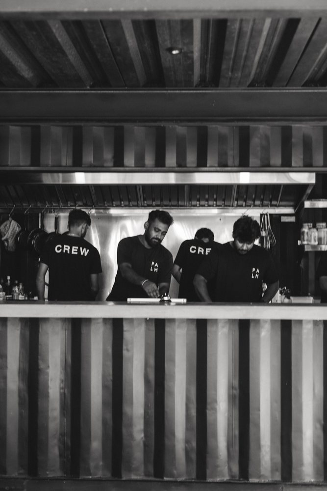 The PALM kitchen crew at the pass