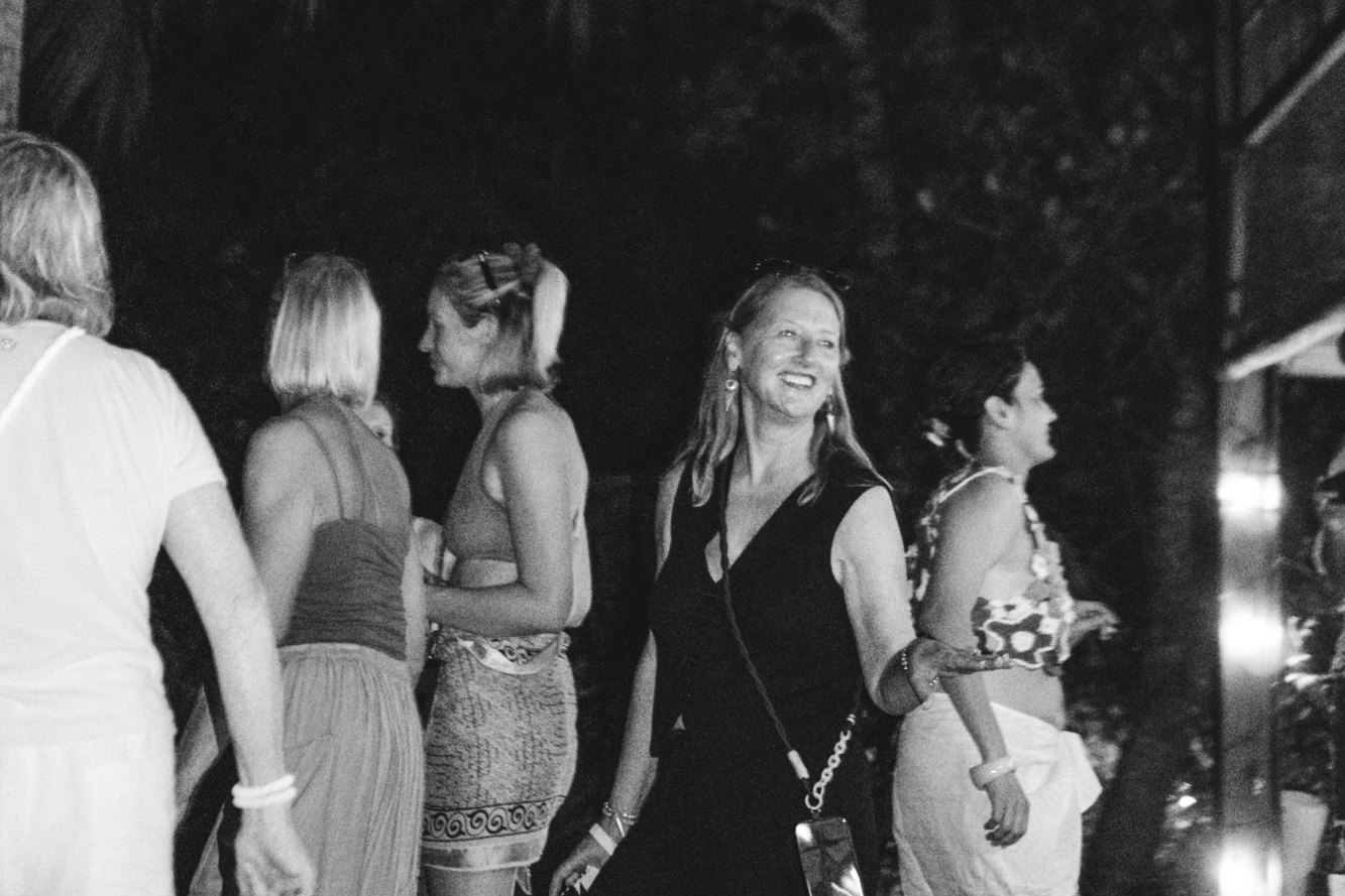 Friends at a night gathering at PALM