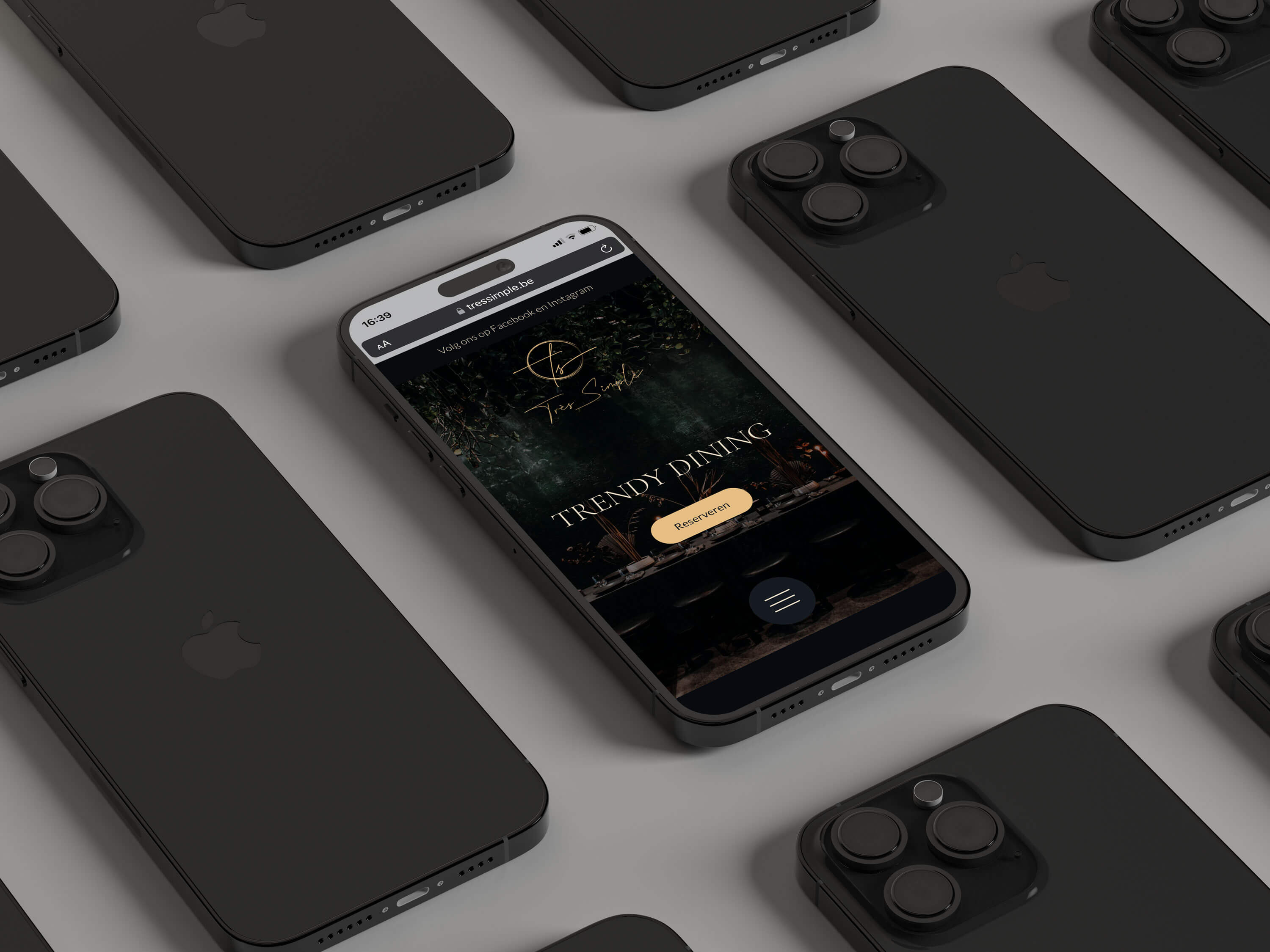 Black smartphones with one displaying a portfolio project of Ada Design.