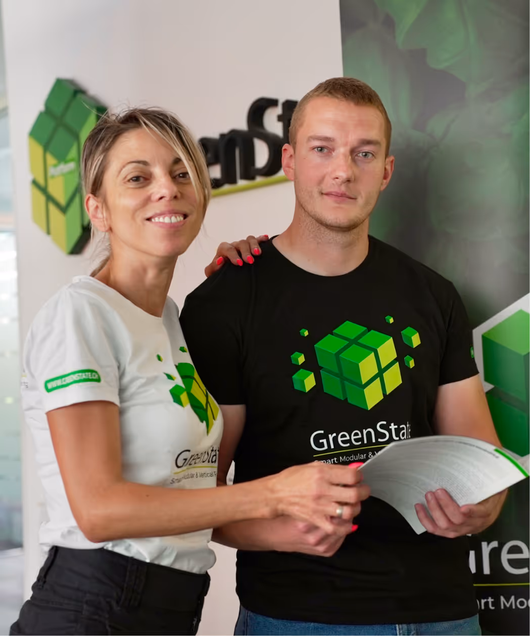 Two employees in a hall