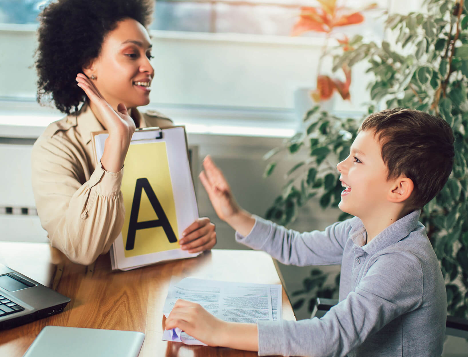 Teacher teaching child