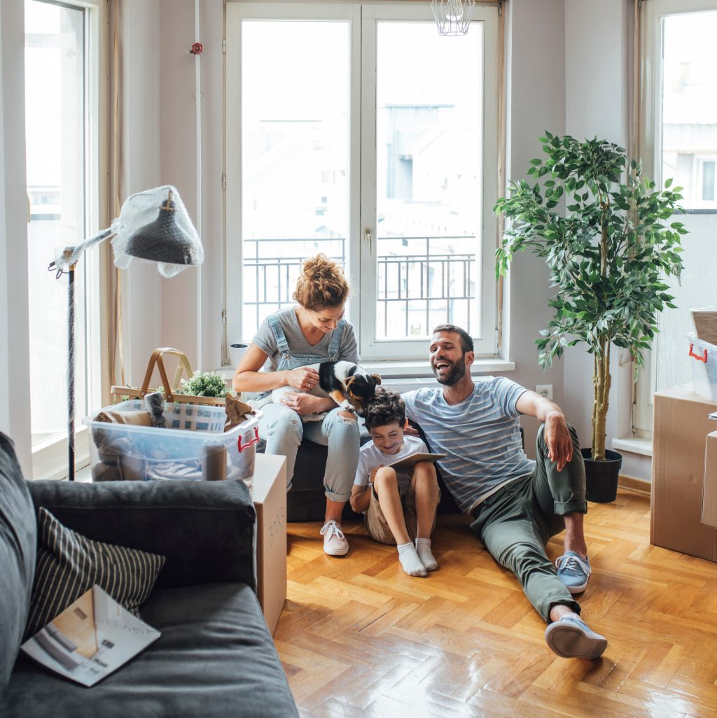 Happy family laughing at home
