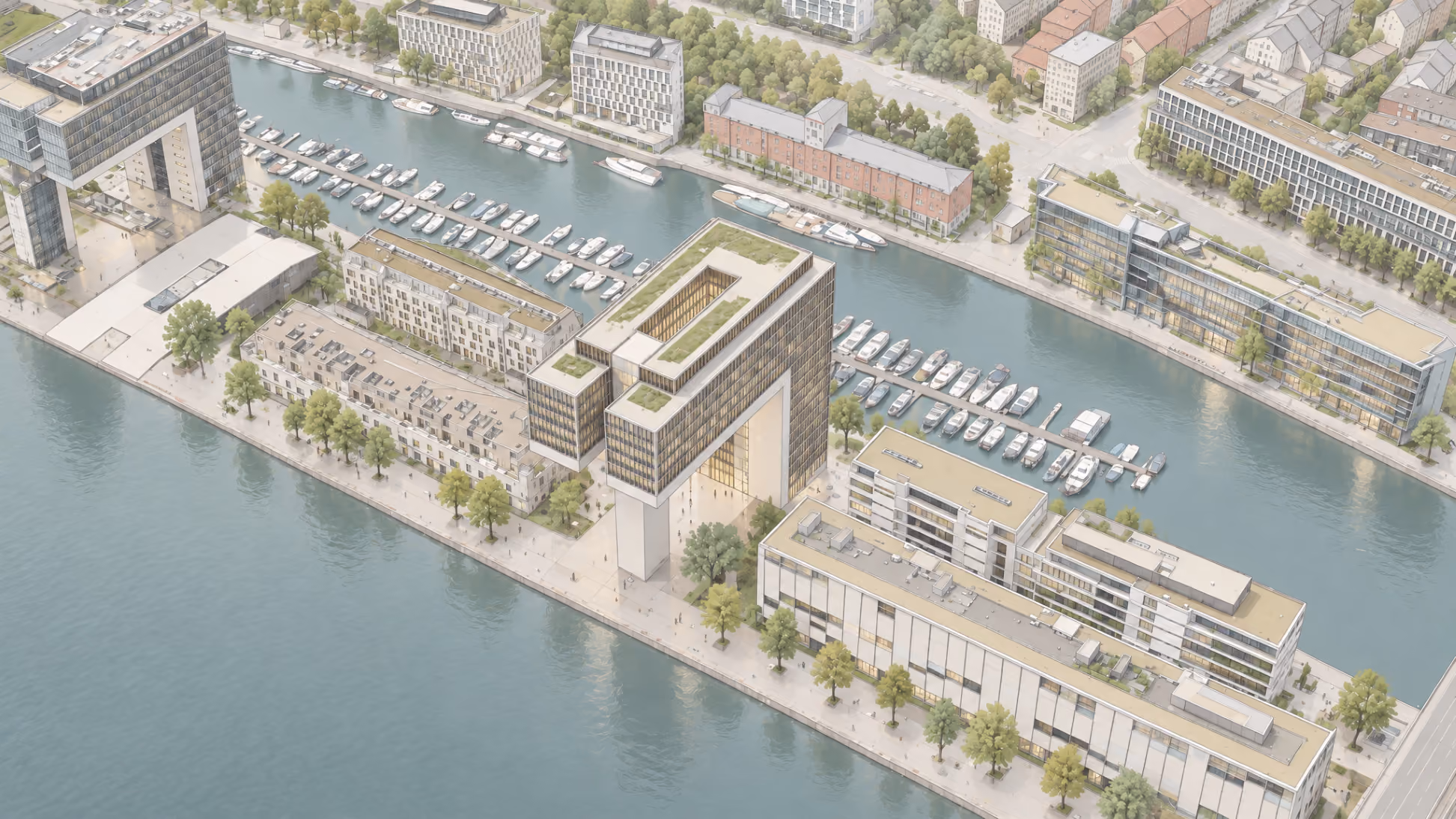 Aerial view of a modern waterfront urban development with buildings featuring rooftop gardens, a central U-shaped high-rise with an open courtyard, tree-lined walkways, and docks with boats along a canal.