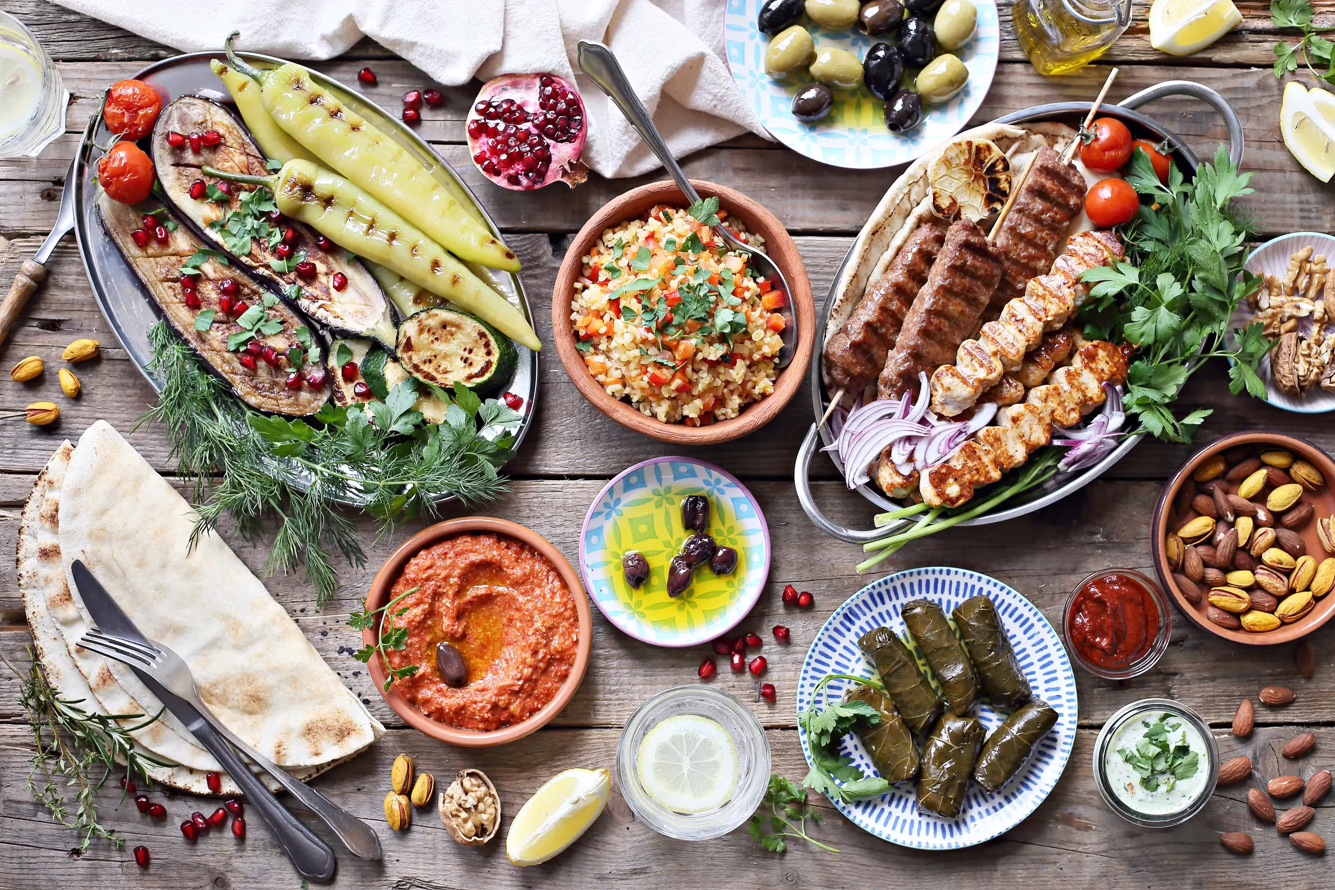 top view of many plates with mediterranean food