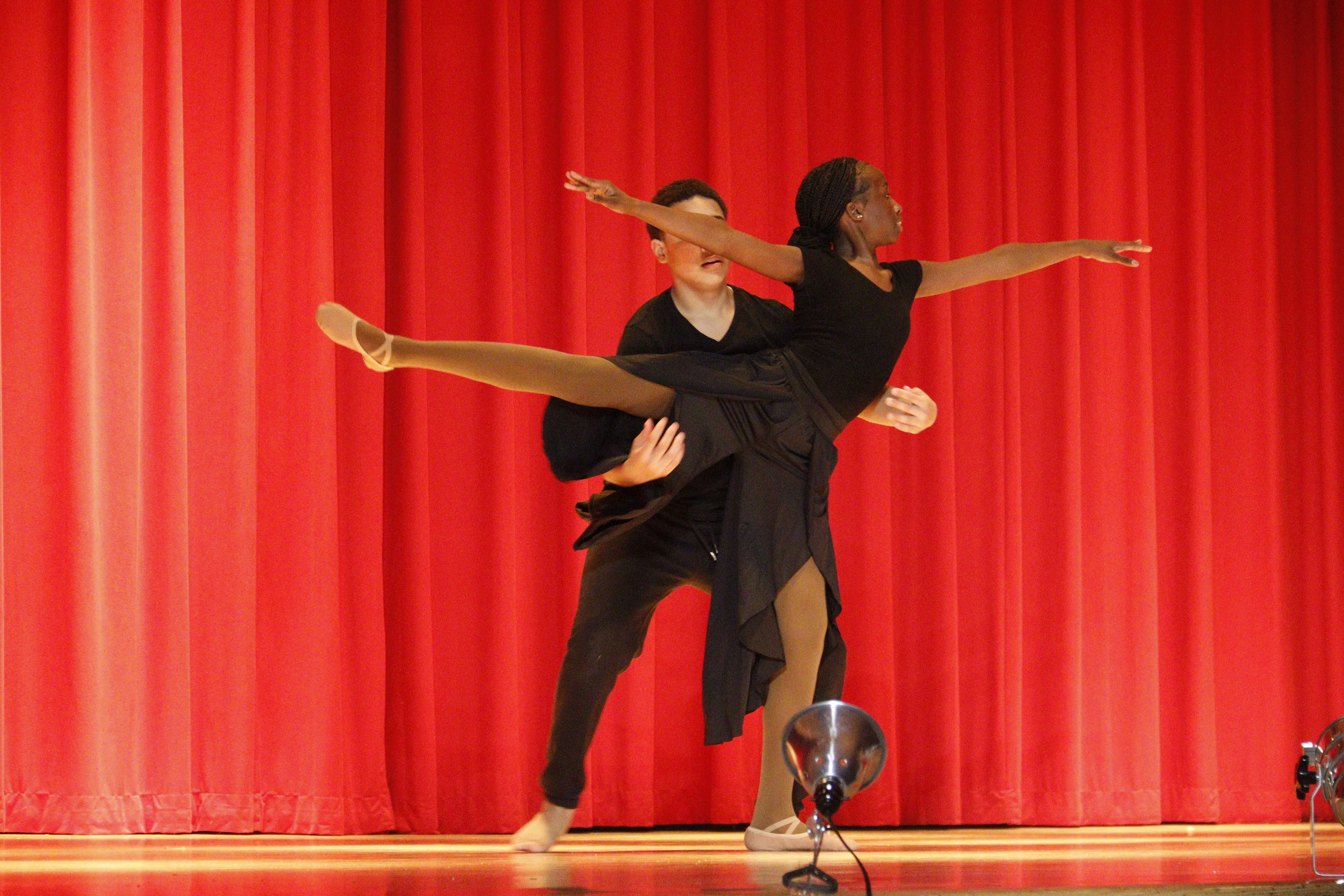 Hendrickson in school auditorium