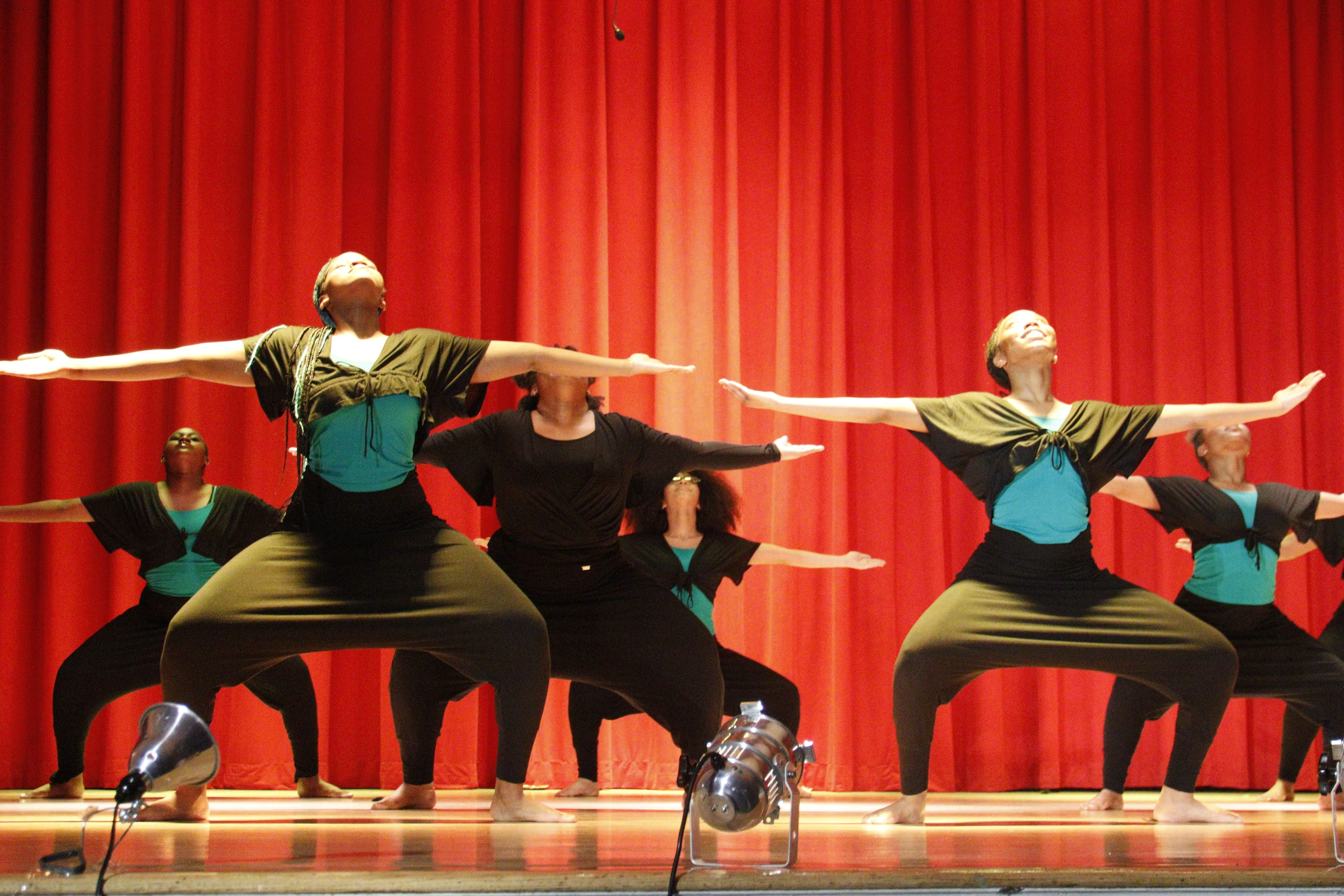 Principal Hendrickson in crest sweater