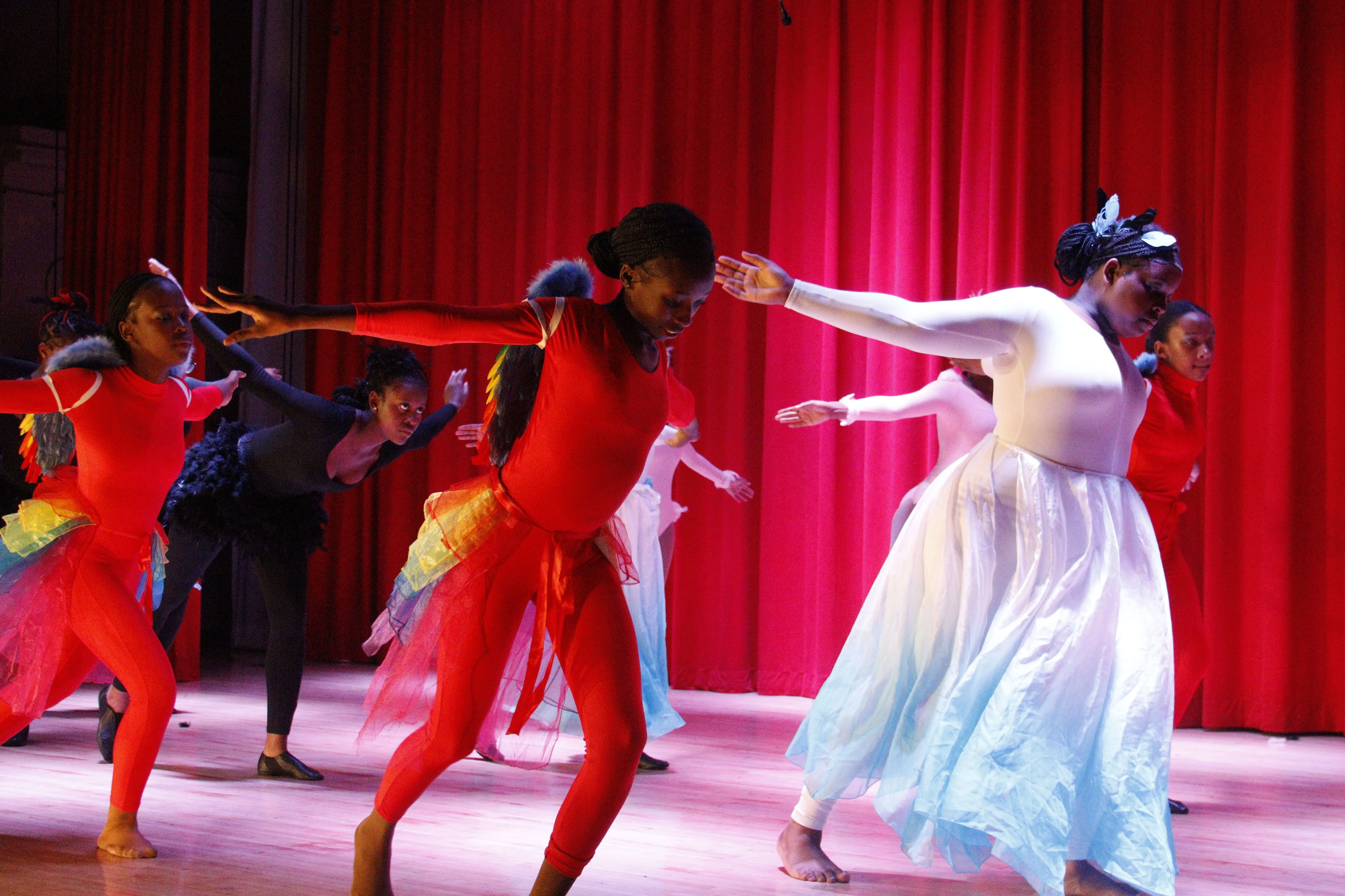 Principal Hendrickson in school auditorium