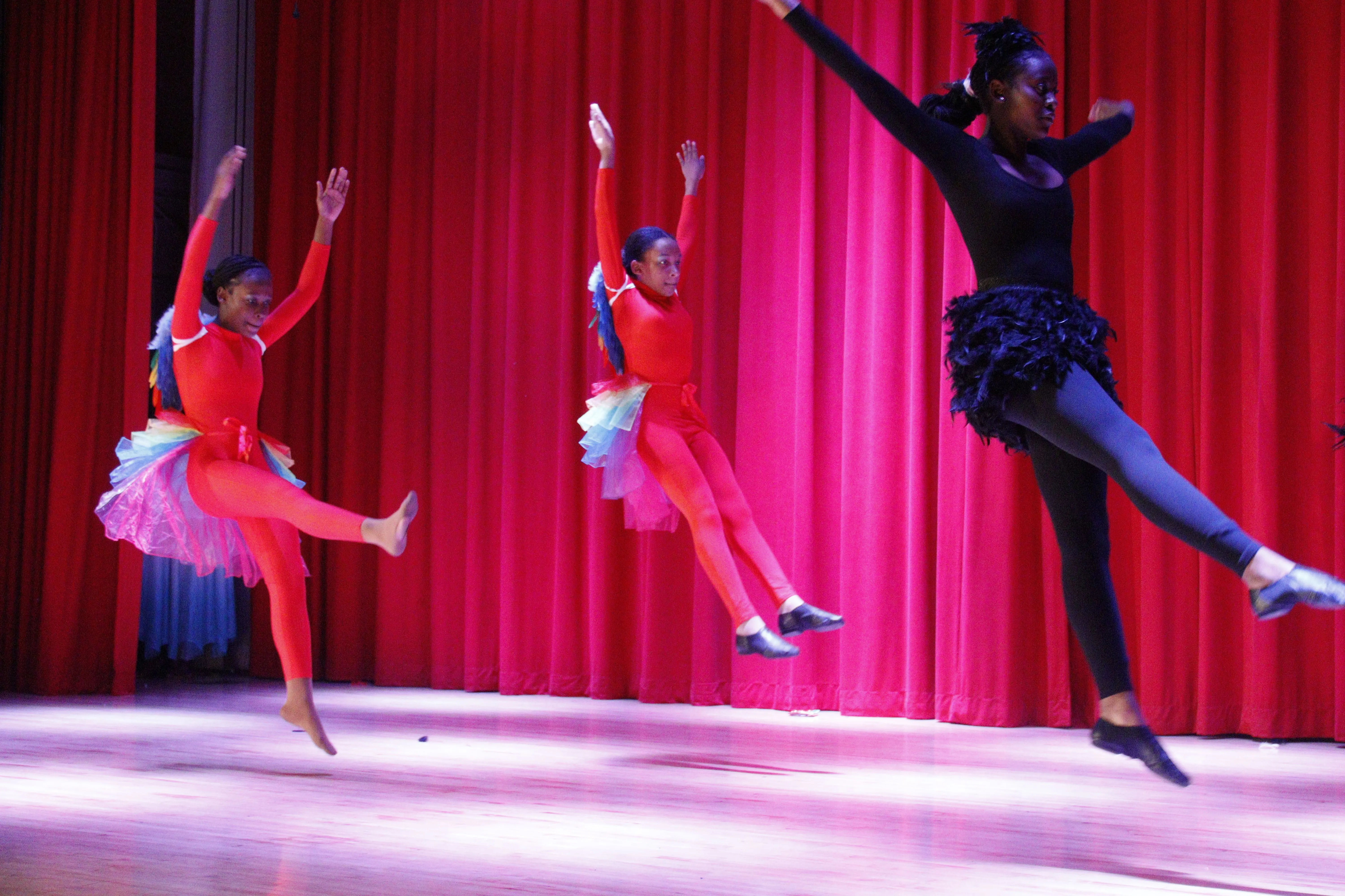 Principal Hendrickson in auditorium, Brooklyn