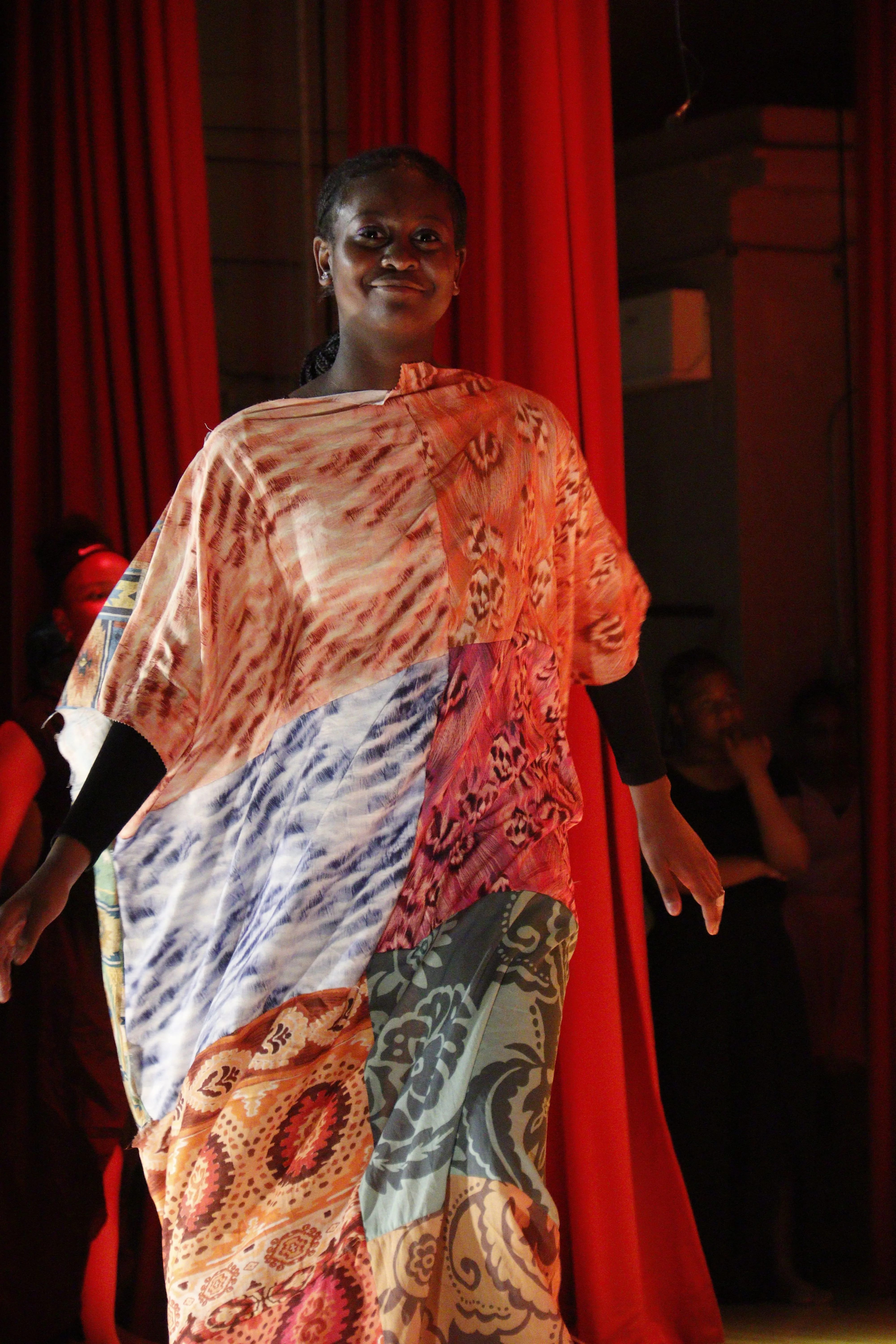 Principal Hendrickson in school crest sweater