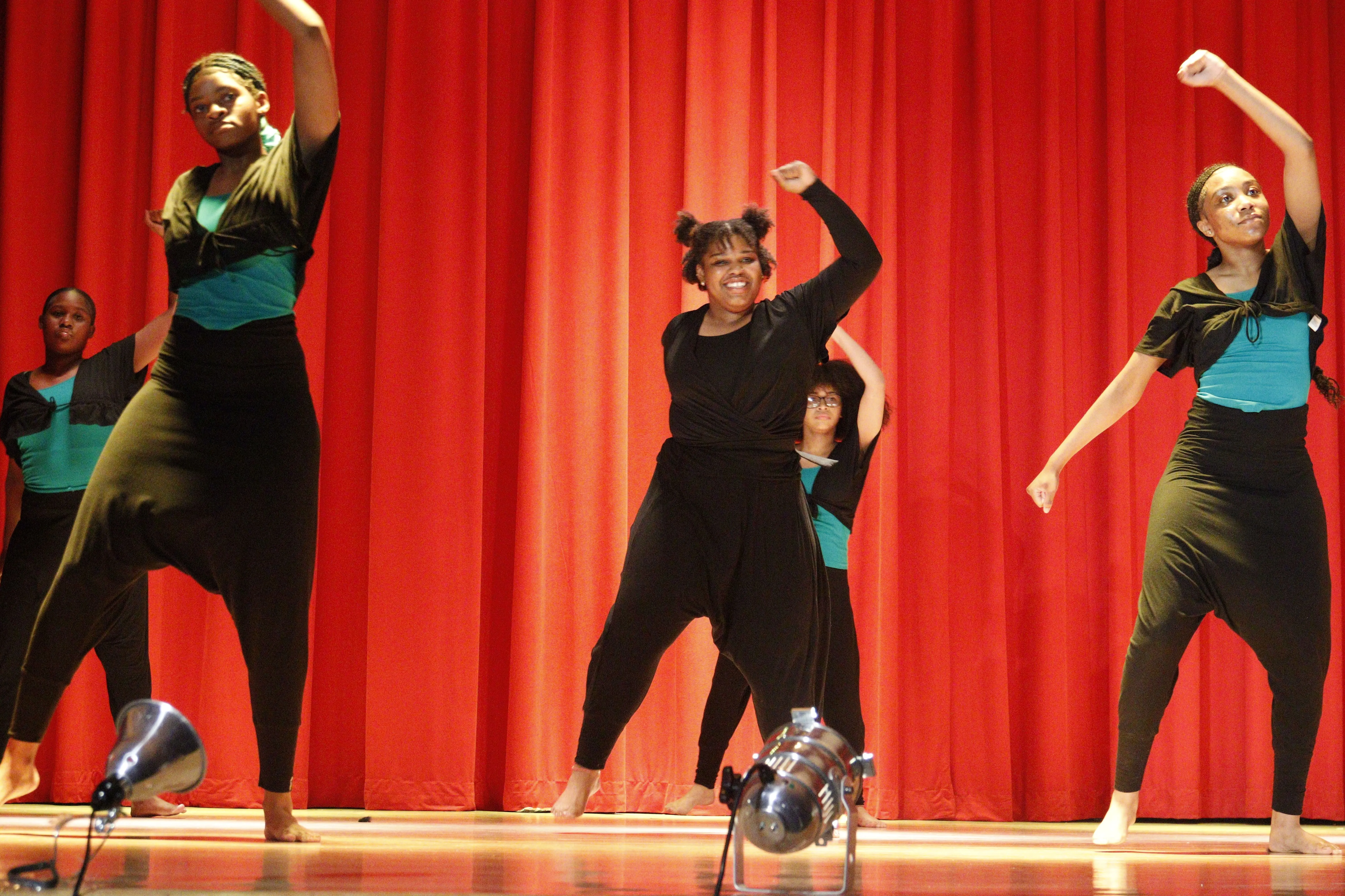 Performers executing dynamic choreography