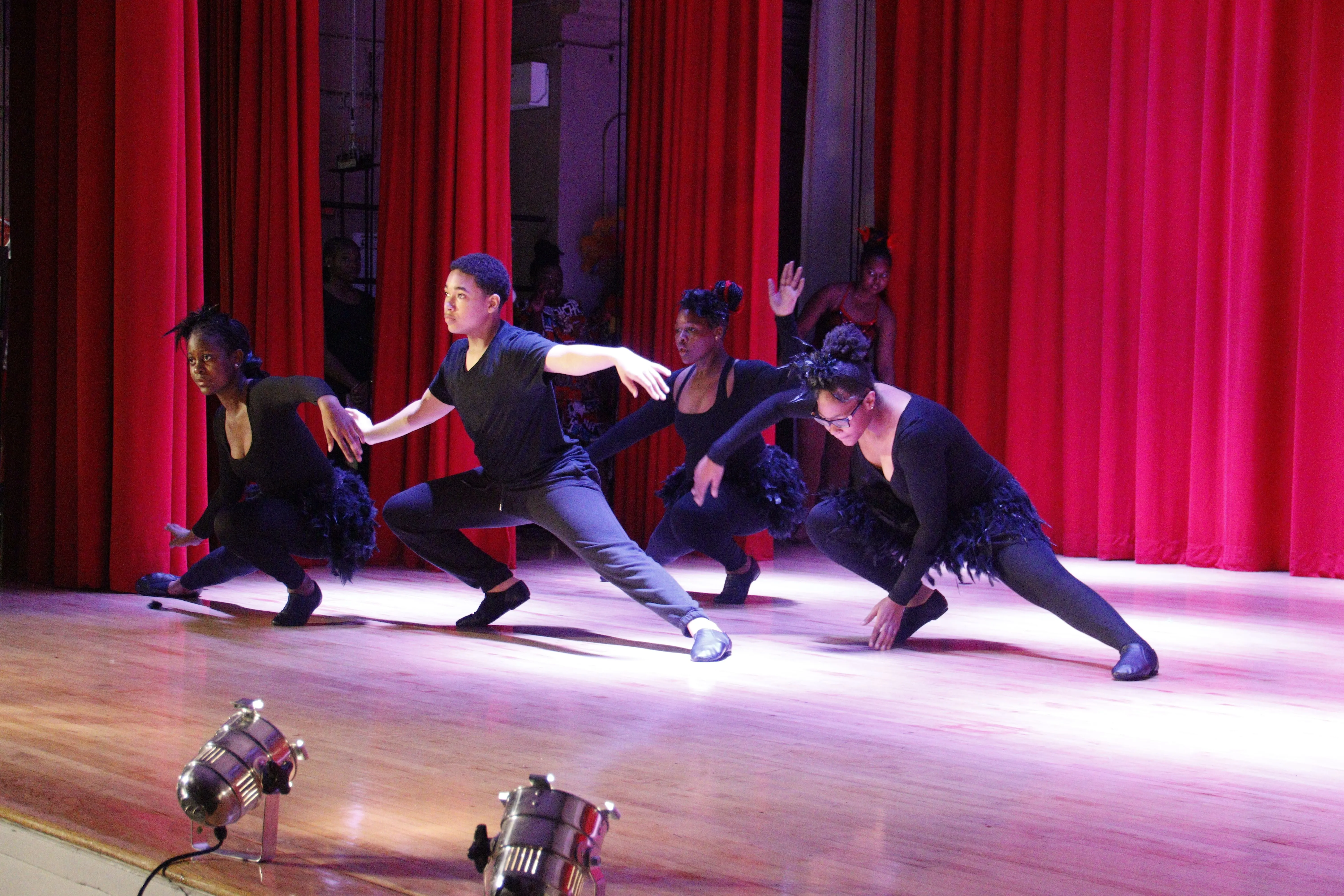Dancers posing in dynamic formation