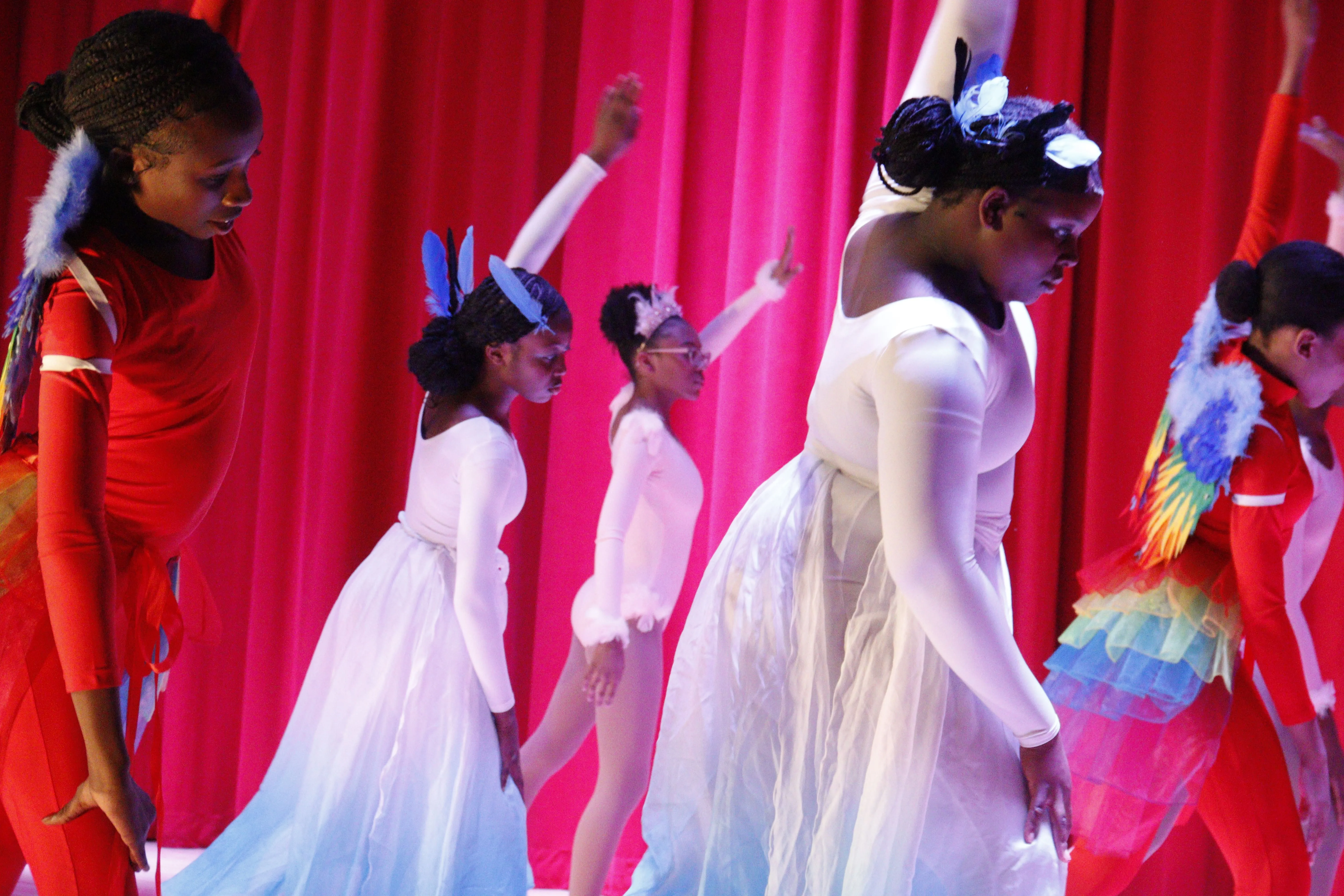 Group of dancers performing on stage
