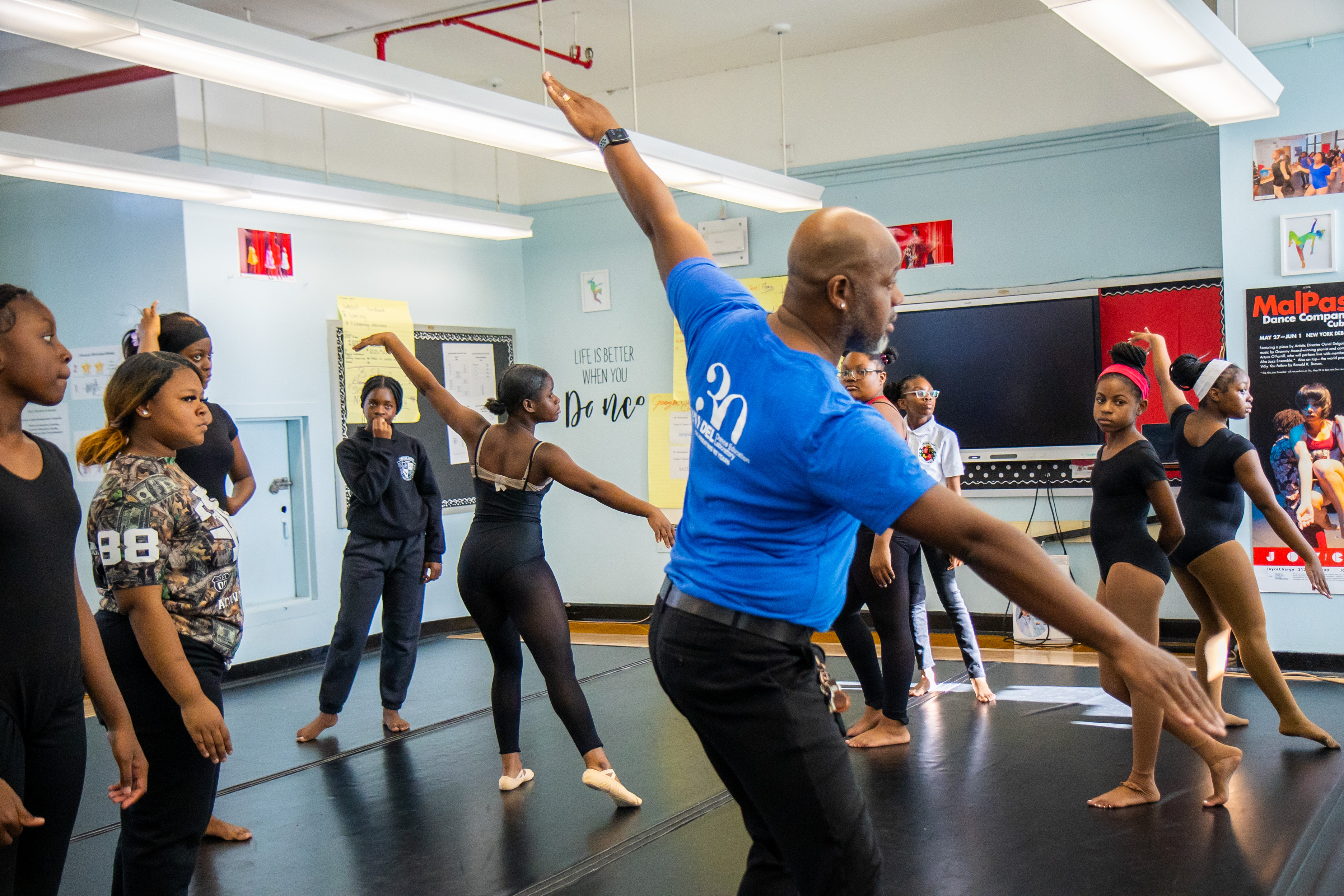 Students stretching in dance studio