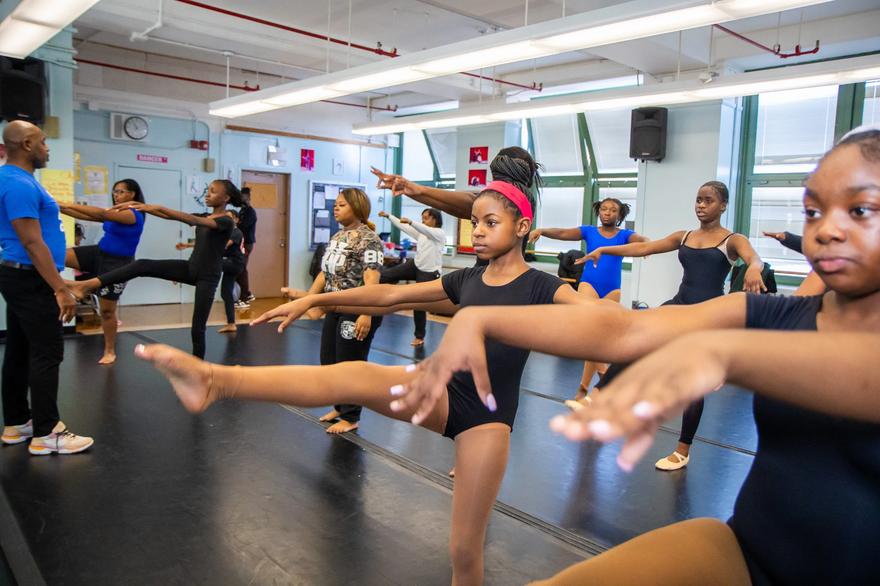 Students stretching in dance studio