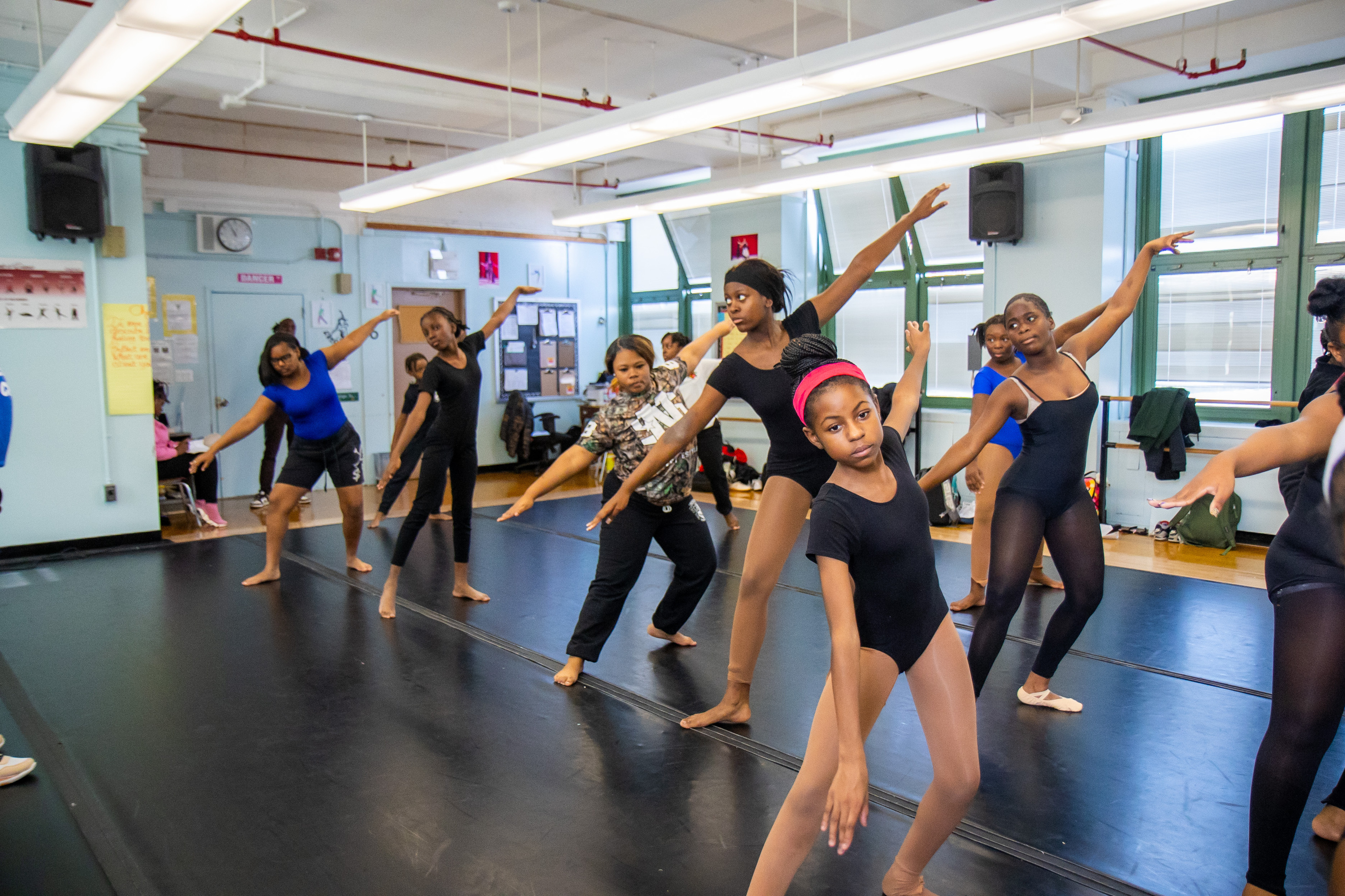 Students stretching in dance studio