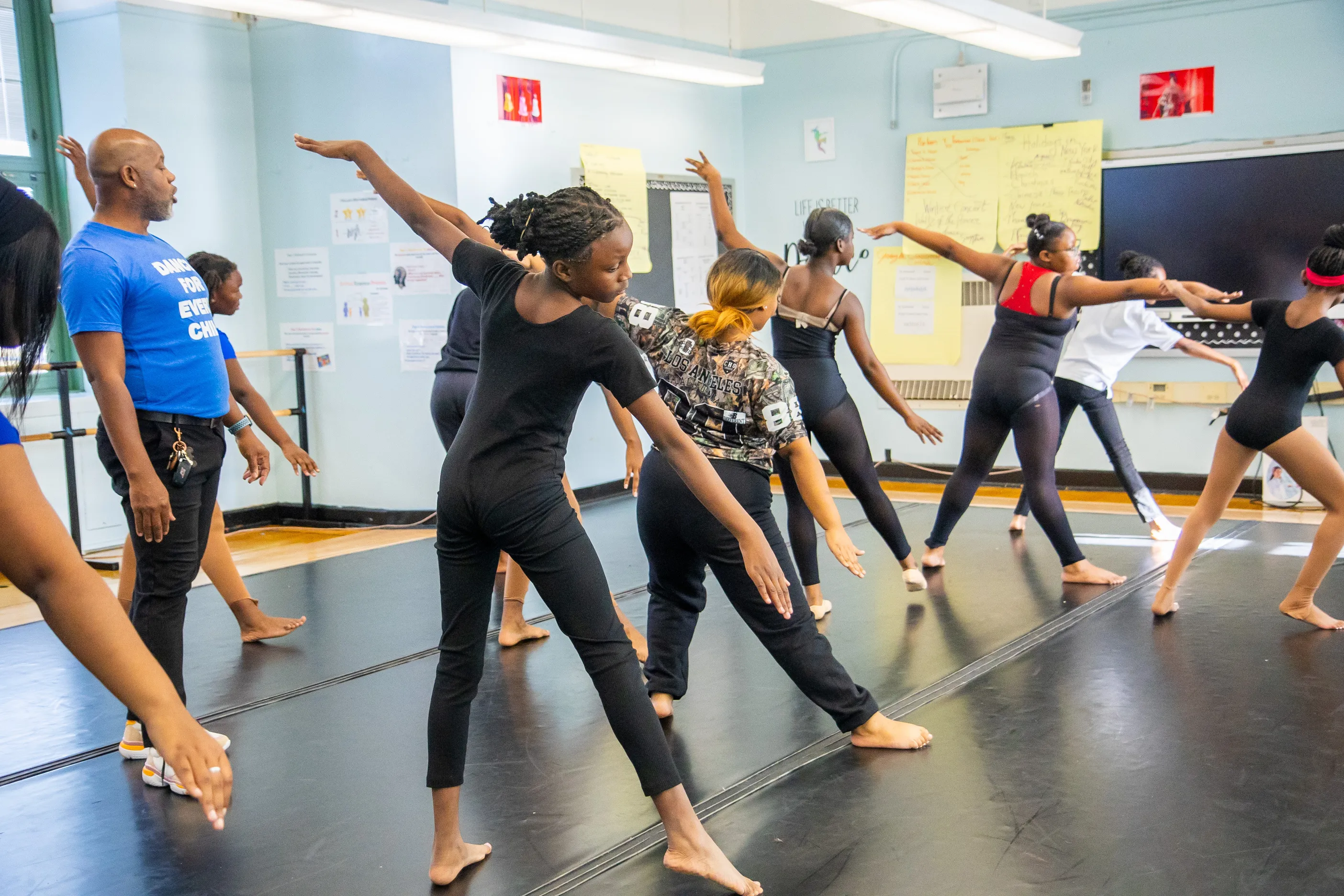 Students stretching in dance studio