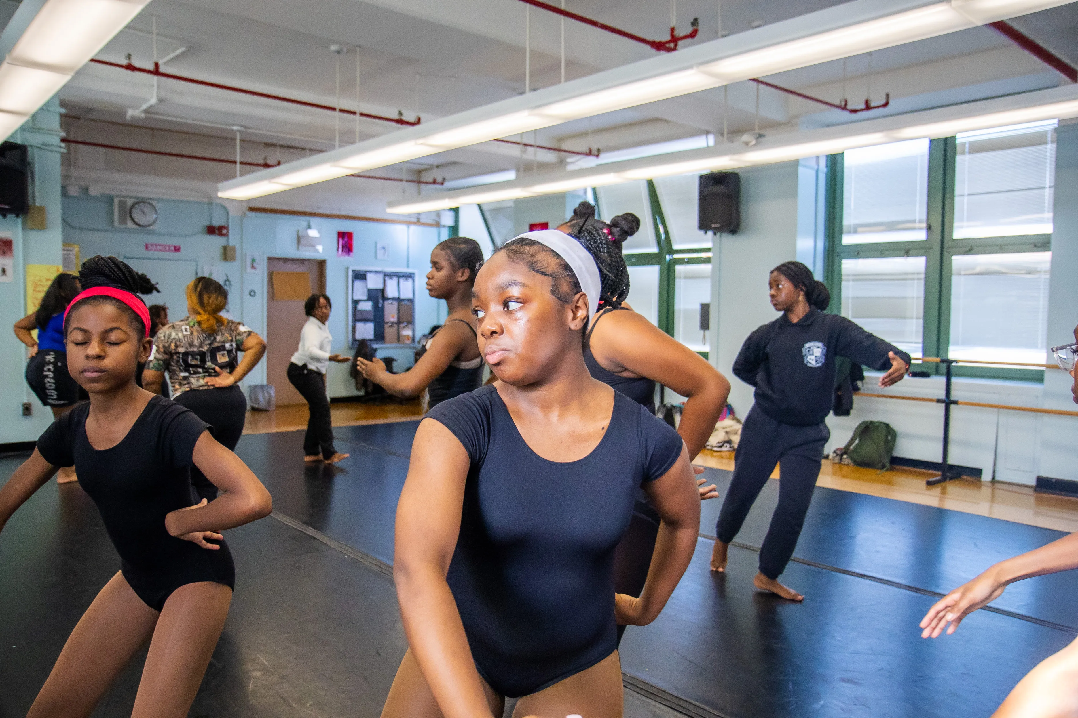 Students stretching in dance studio