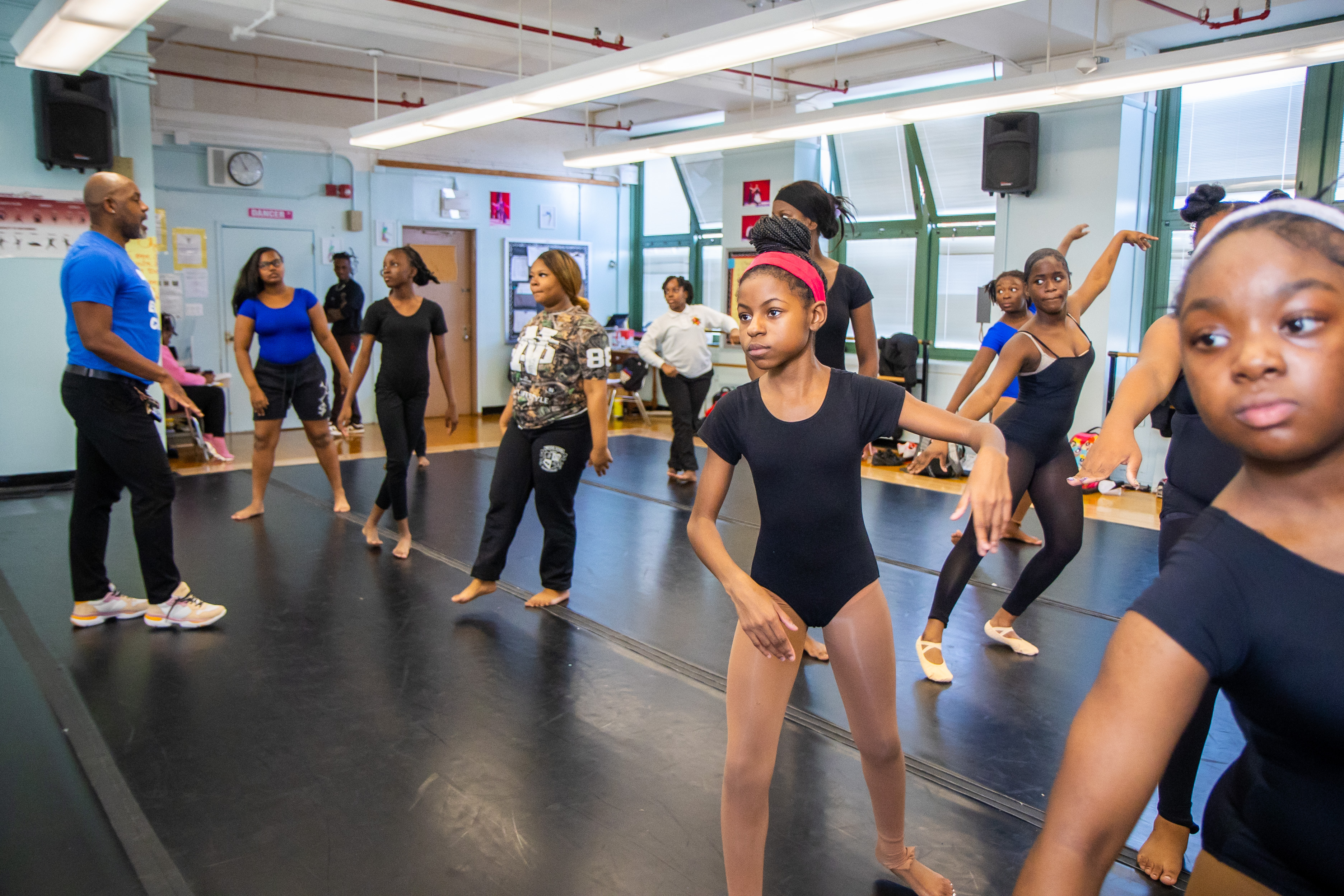 Students stretching in dance studio