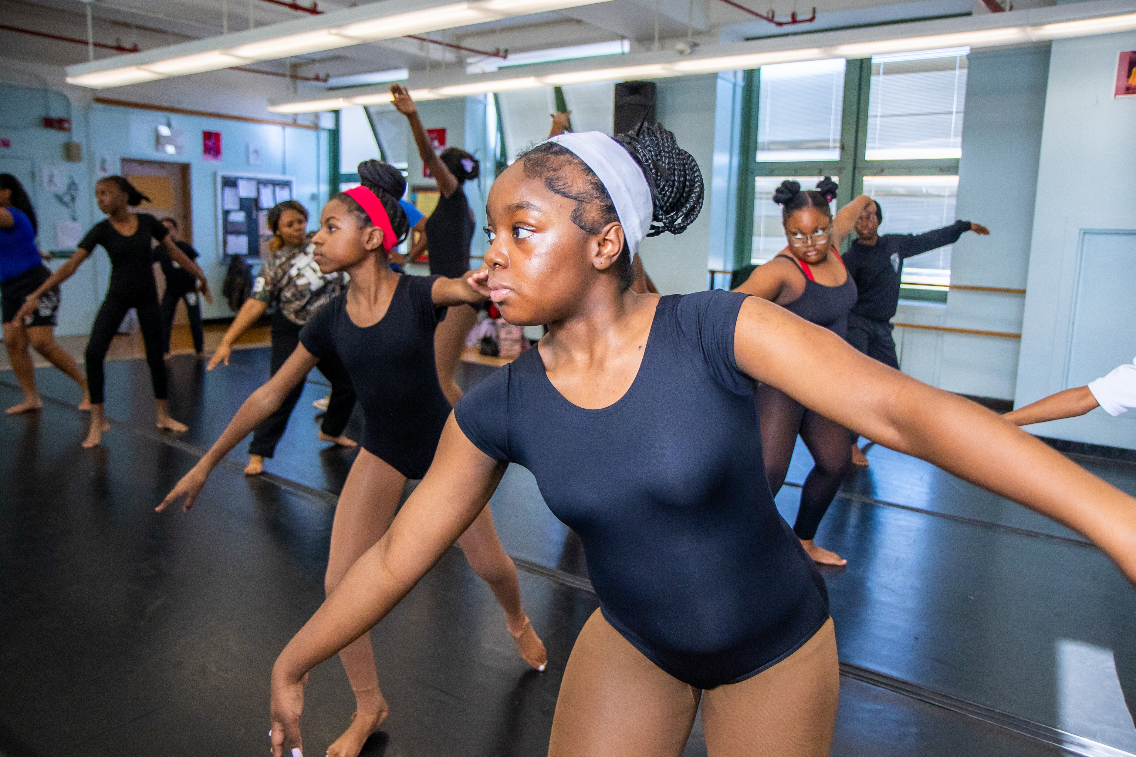Students stretching in dance studio