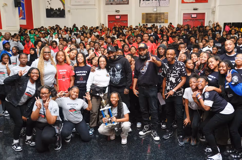 Students and staff with trophy