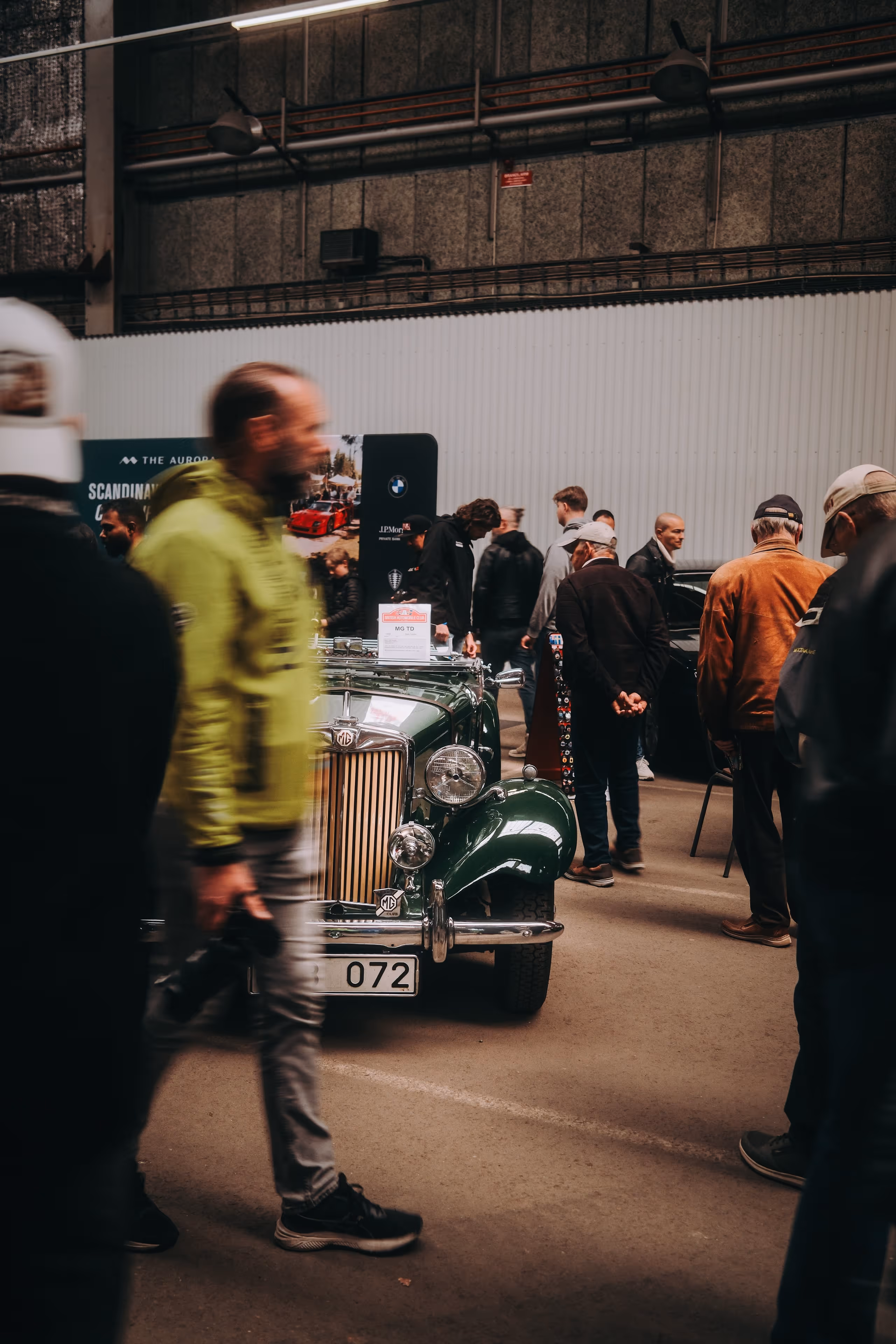 Two vehicles in a garage at gothenburg classic car weekend