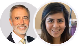 Portraits of a smiling middle-aged man with gray hair and beard in a suit, and a young woman with dark hair smiling.